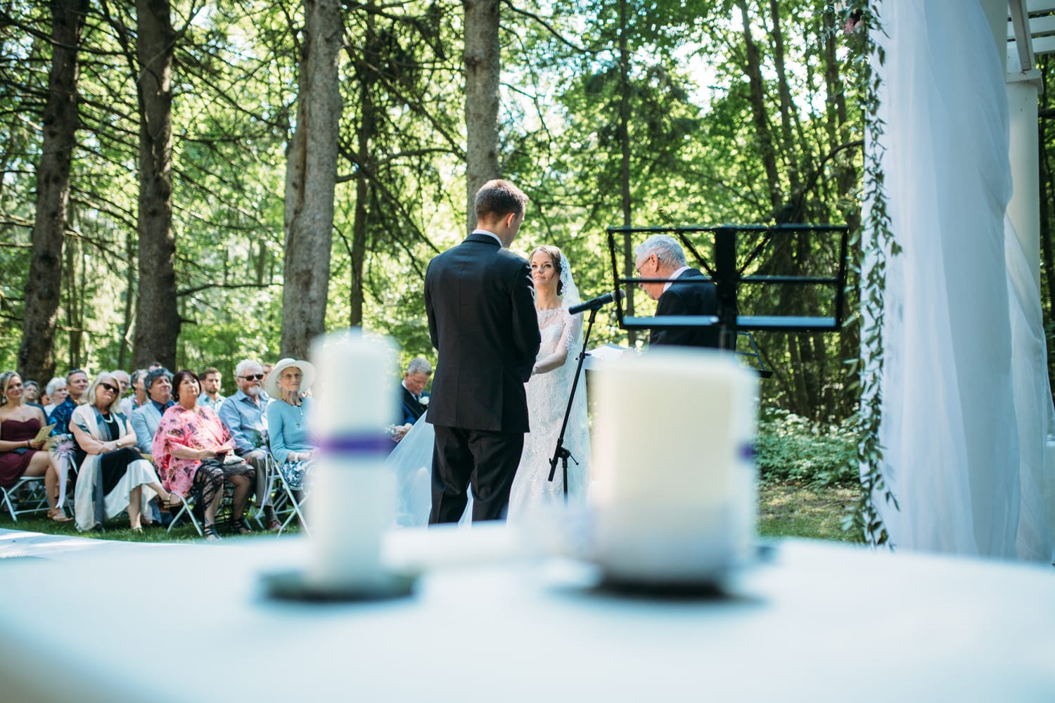 Ciara and Mikie weddings story frame 13: An Ontario wedding near Peterborough, with archive clues pointing to Trent University or Elmhirst Resort and a full reception-to-after-party story..