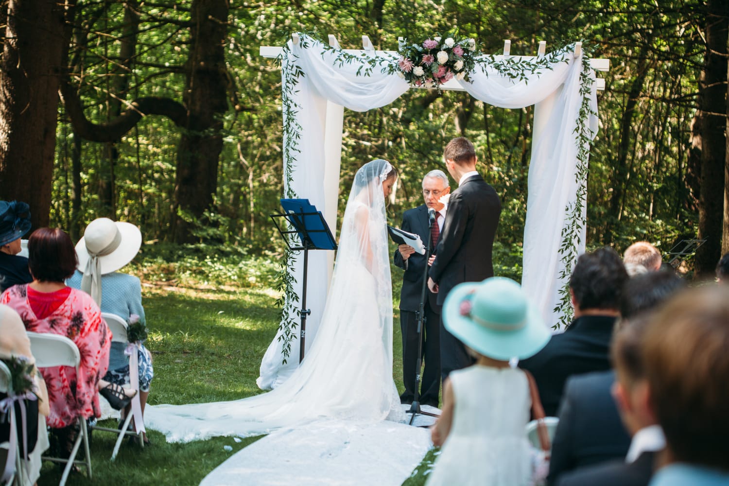 Ciara and Mikie weddings story frame 16: An Ontario wedding near Peterborough, with archive clues pointing to Trent University or Elmhirst Resort and a full reception-to-after-party story..
