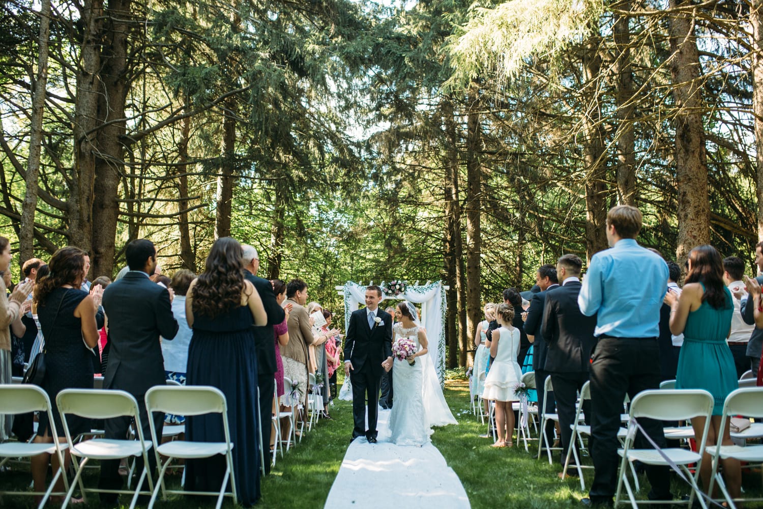 Ciara and Mikie weddings story frame 20: An Ontario wedding near Peterborough, with archive clues pointing to Trent University or Elmhirst Resort and a full reception-to-after-party story..