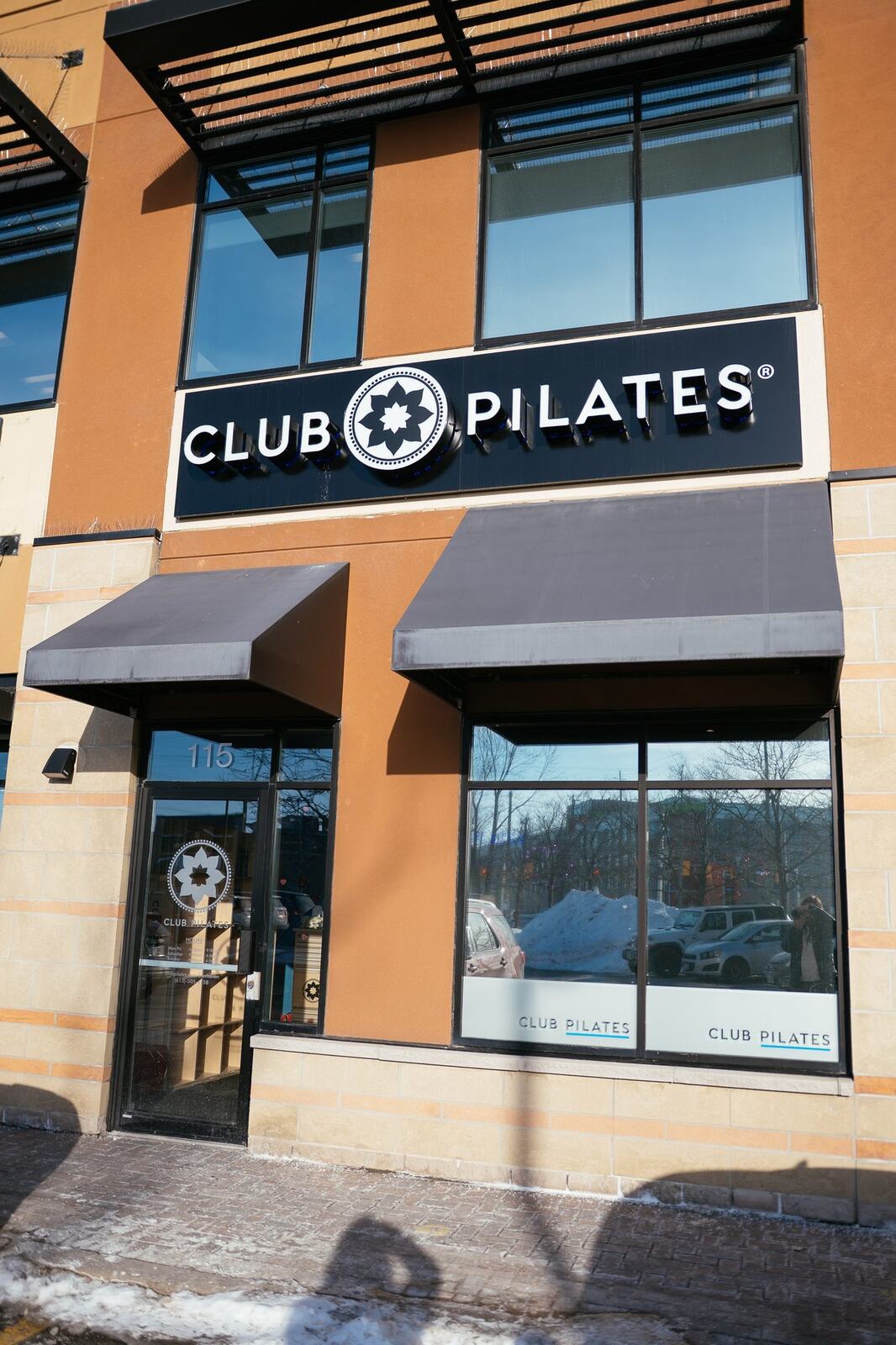 Club Pilates Barrhaven corporate story frame 2: Brand photography for Club Pilates Barrhaven in the Ottawa area, with studio interiors, staff portraits, private training rooms, equipment details and class movement for local marketing..