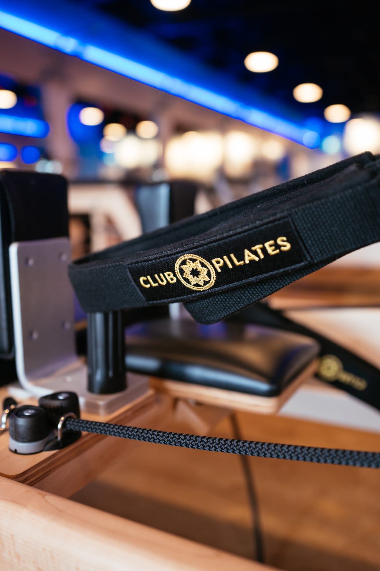Club Pilates Barrhaven corporate story frame 4: Brand photography for Club Pilates Barrhaven in the Ottawa area, with studio interiors, staff portraits, private training rooms, equipment details and class movement for local marketing..