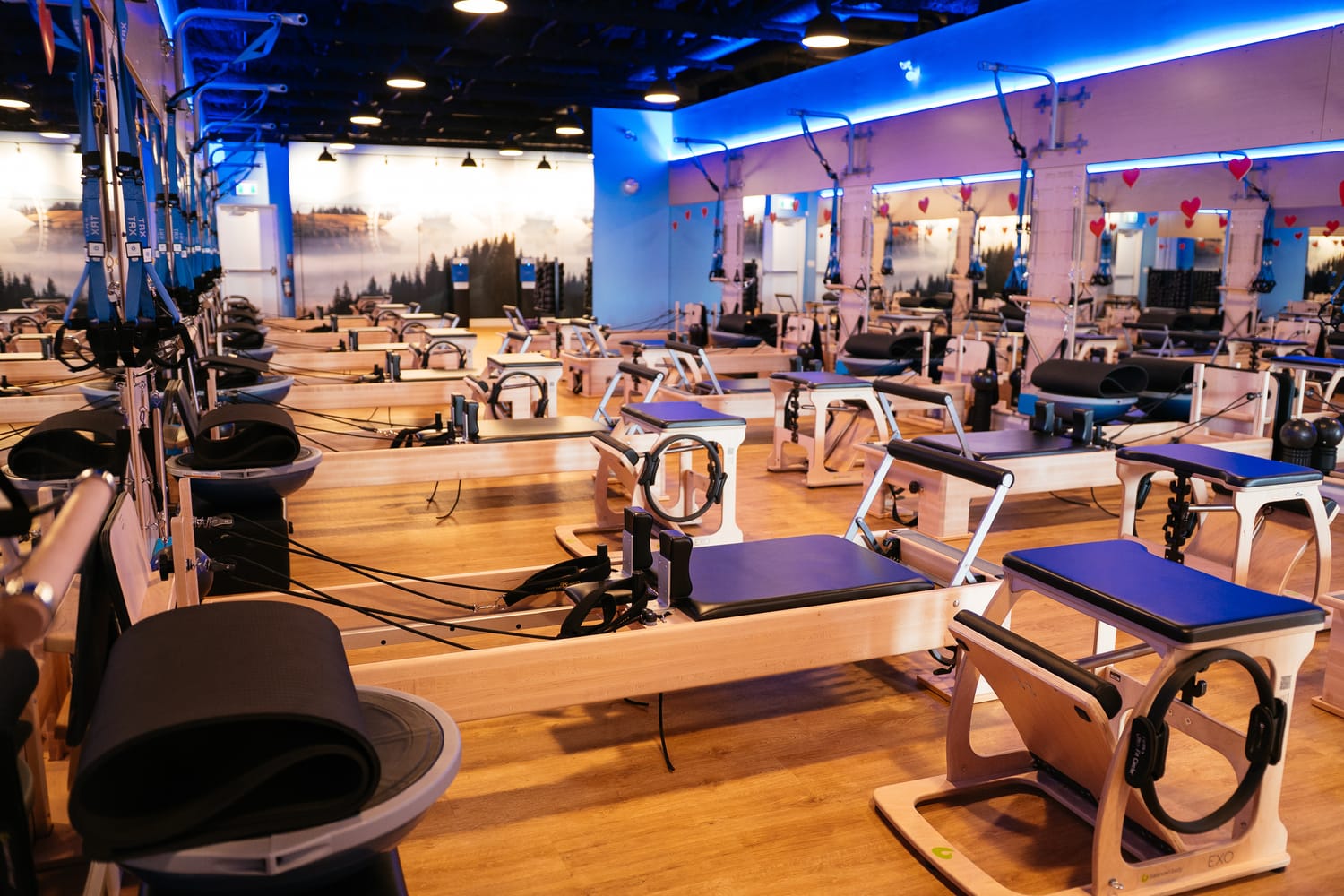 Club Pilates Barrhaven corporate story frame 5: Brand photography for Club Pilates Barrhaven in the Ottawa area, with studio interiors, staff portraits, private training rooms, equipment details and class movement for local marketing..