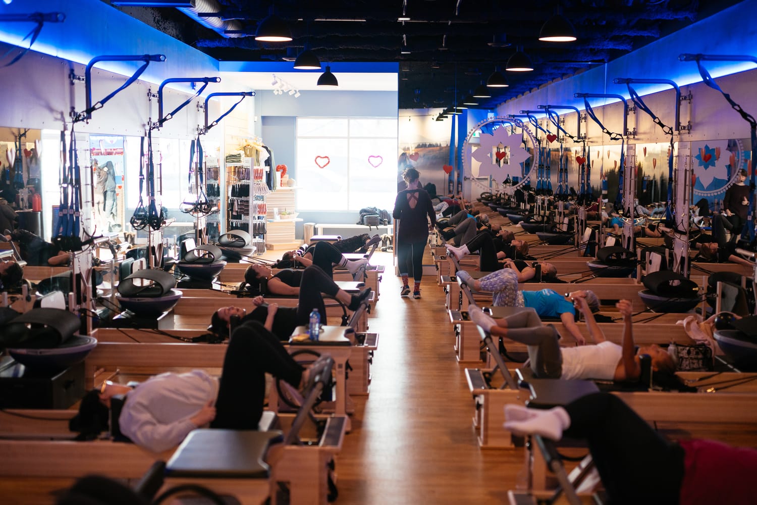 Club Pilates Barrhaven corporate story frame 13: Brand photography for Club Pilates Barrhaven in the Ottawa area, with studio interiors, staff portraits, private training rooms, equipment details and class movement for local marketing..