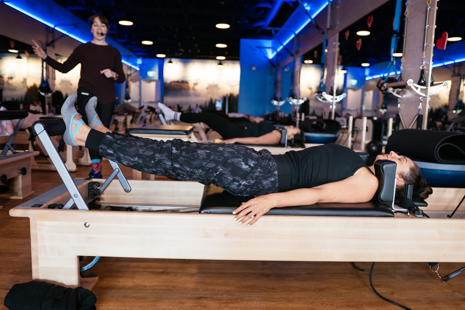 Club Pilates Barrhaven corporate story frame 24: Brand photography for Club Pilates Barrhaven in the Ottawa area, with studio interiors, staff portraits, private training rooms, equipment details and class movement for local marketing..