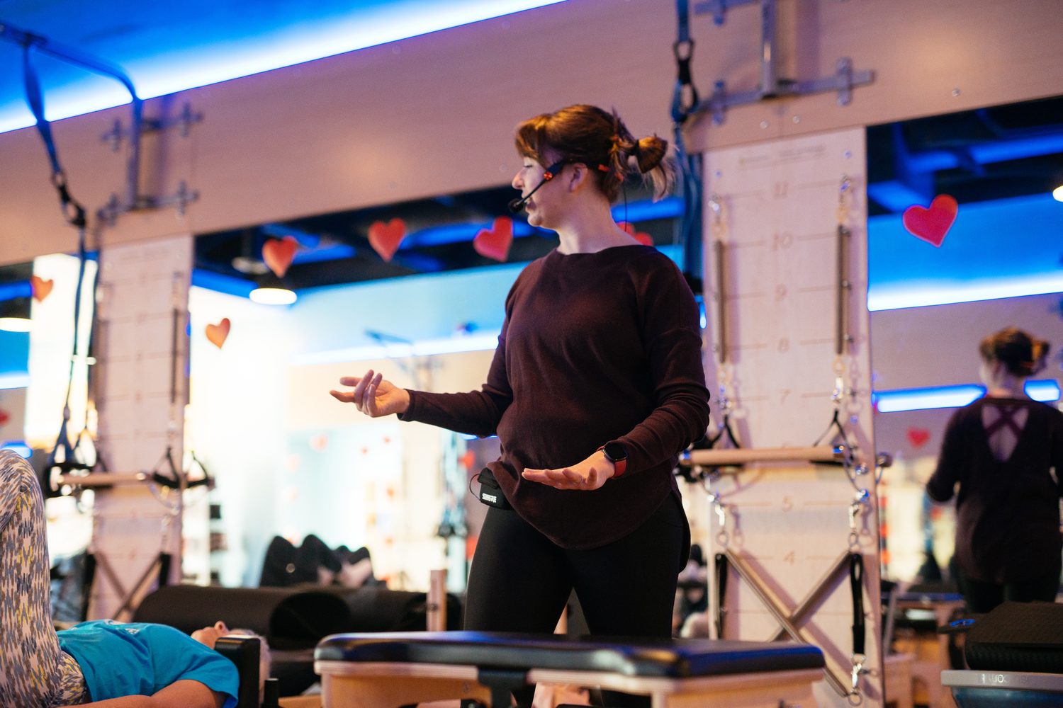 Club Pilates Barrhaven corporate story frame 29: Brand photography for Club Pilates Barrhaven in the Ottawa area, with studio interiors, staff portraits, private training rooms, equipment details and class movement for local marketing..