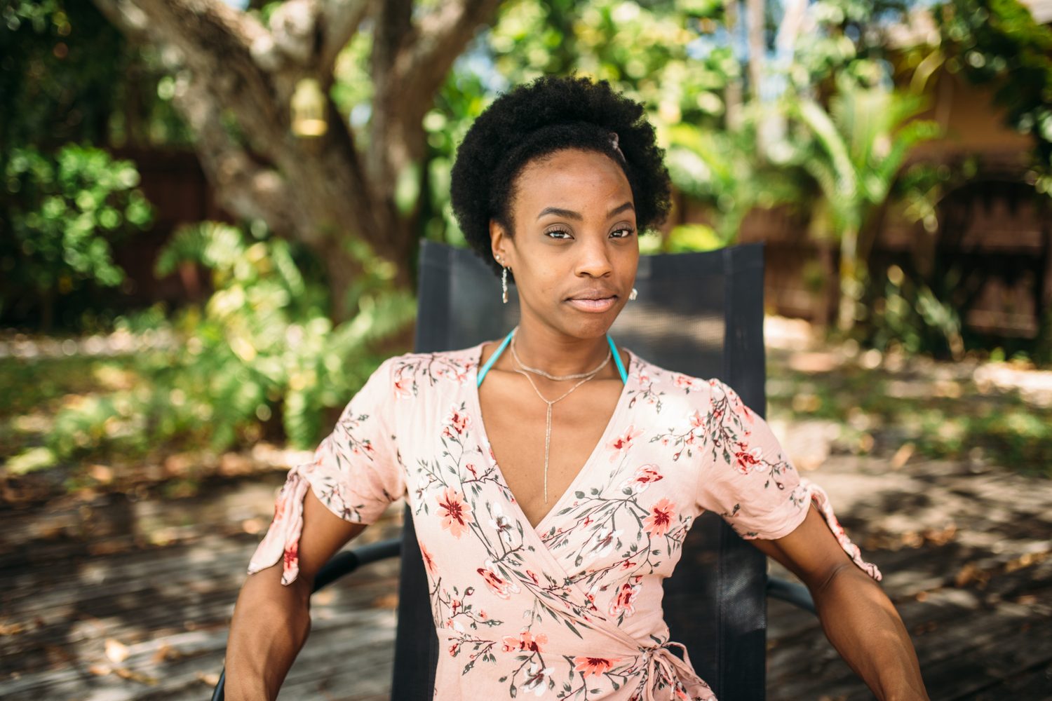 Dee-J by the Pool in Miami portraits story frame 16: Poolside portraits with Dee-J Spaulding in Miami, moving through direct expression, swimwear details, bright water and warm Florida light.