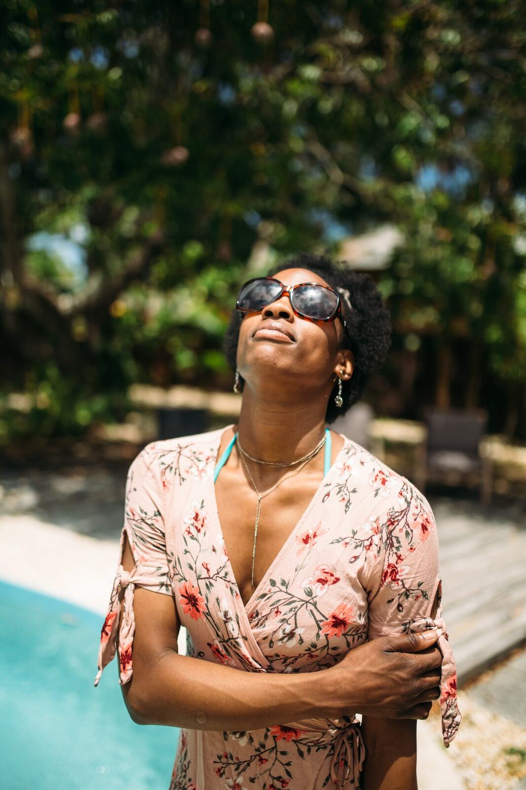 Dee-J by the Pool in Miami portraits story frame 19: Poolside portraits with Dee-J Spaulding in Miami, moving through direct expression, swimwear details, bright water and warm Florida light.