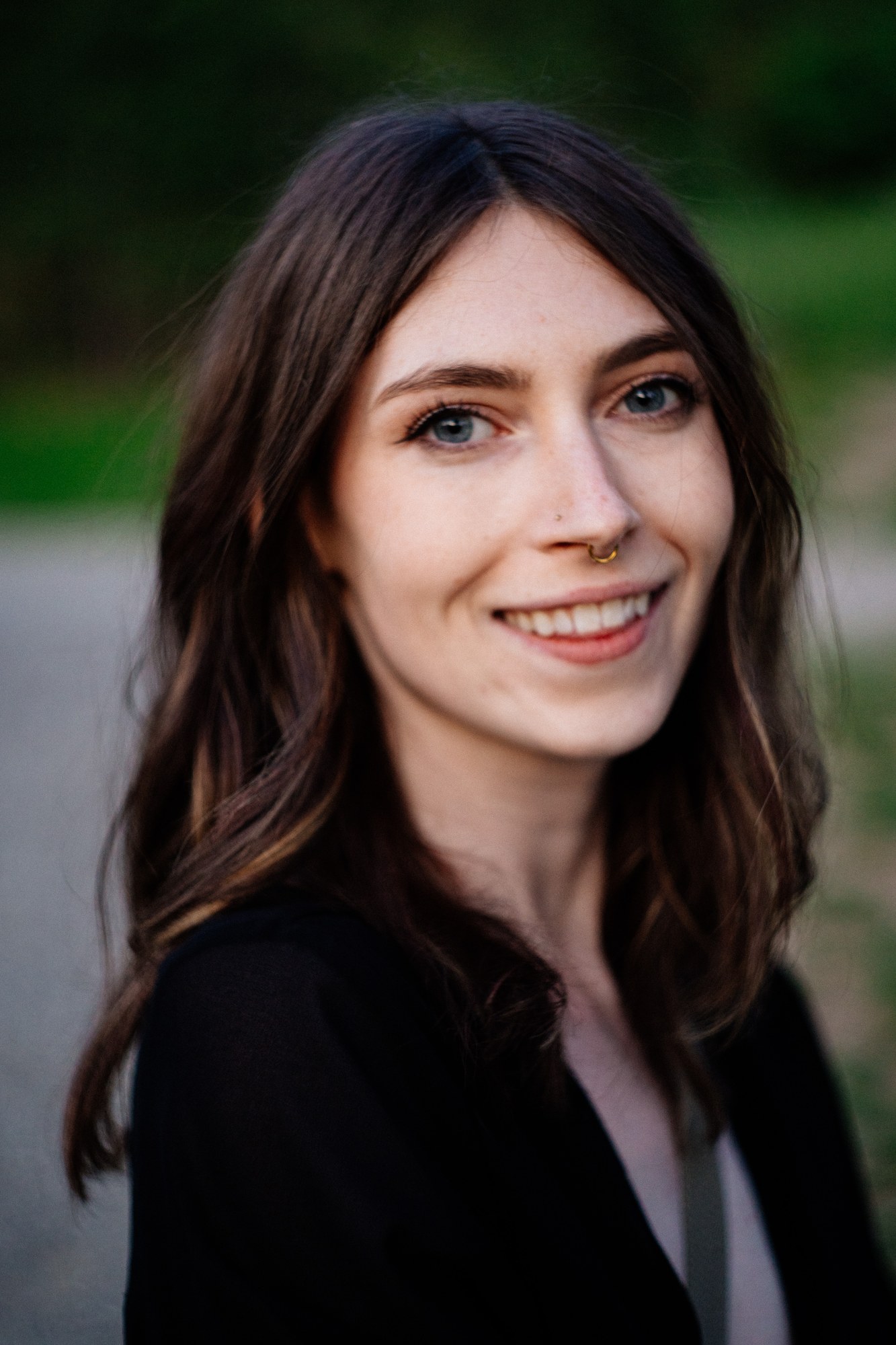 Destiny at Paul’s Tomb: Close smiling portrait beside the lake.