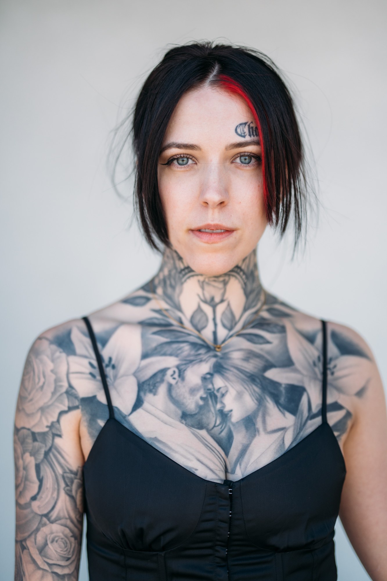 District Ink: Direct individual portrait showing tattoo work.