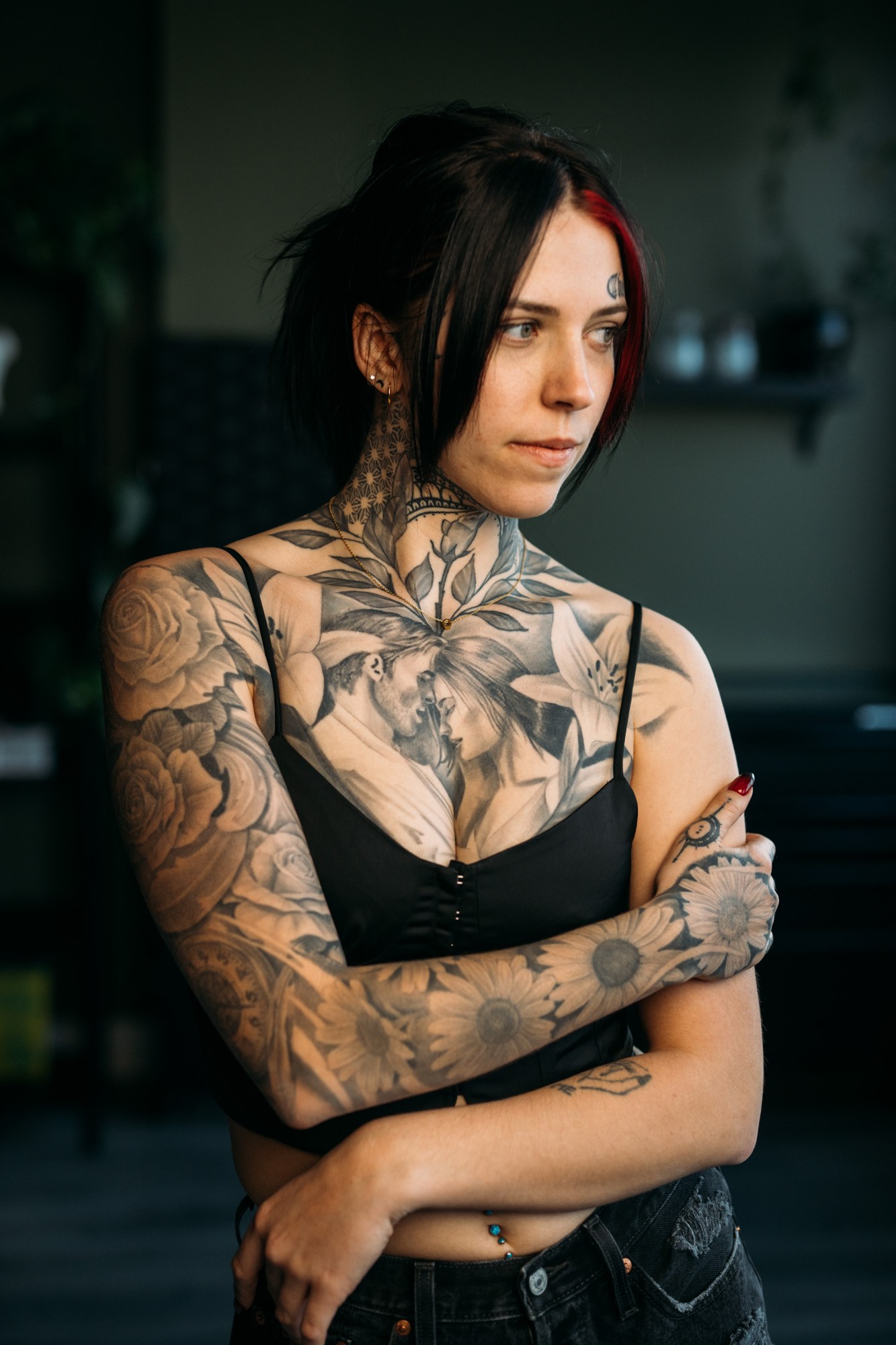 District Ink: Quiet folded-arm portrait.