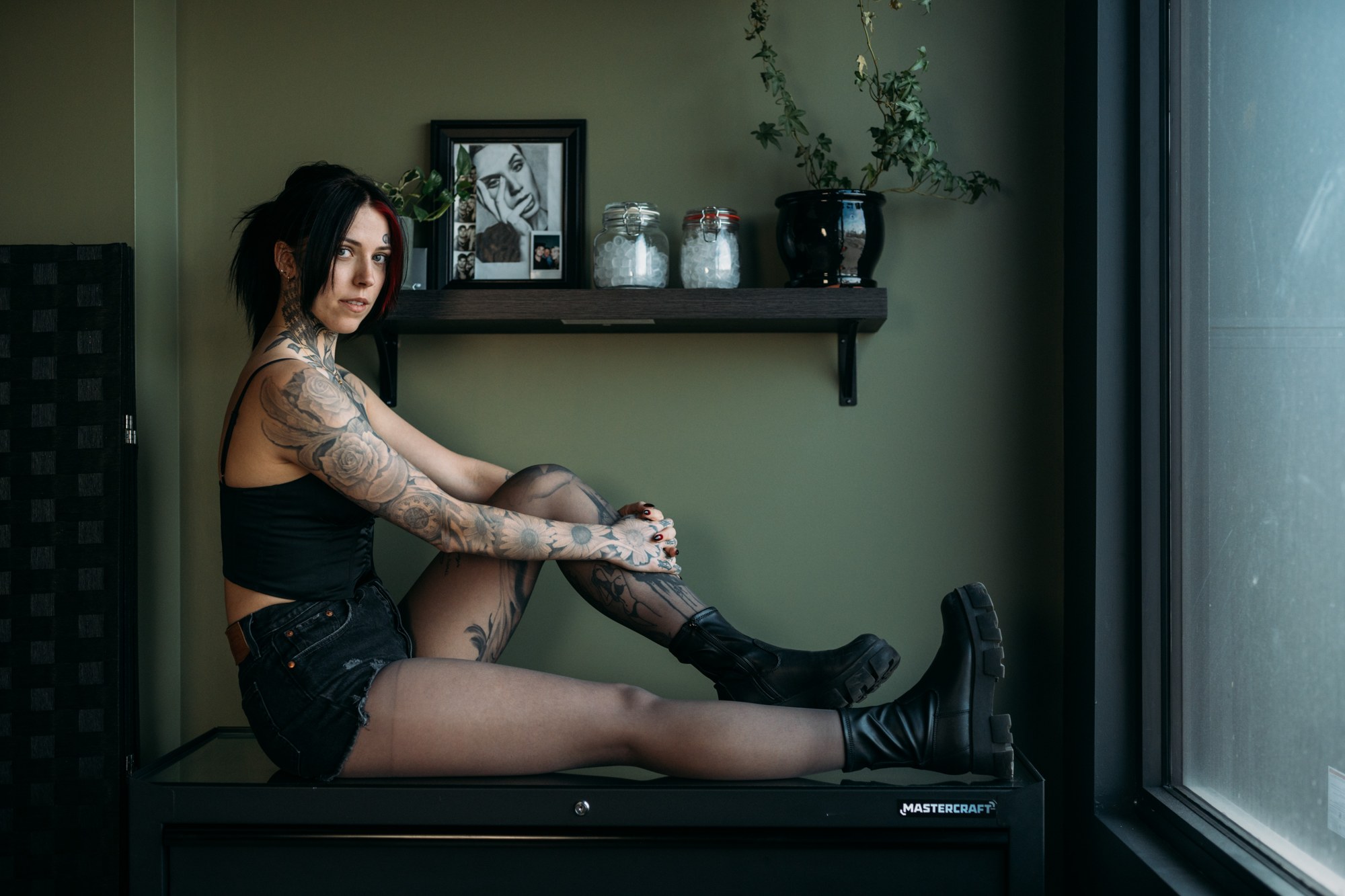 District Ink: Seated side portrait in the working space.