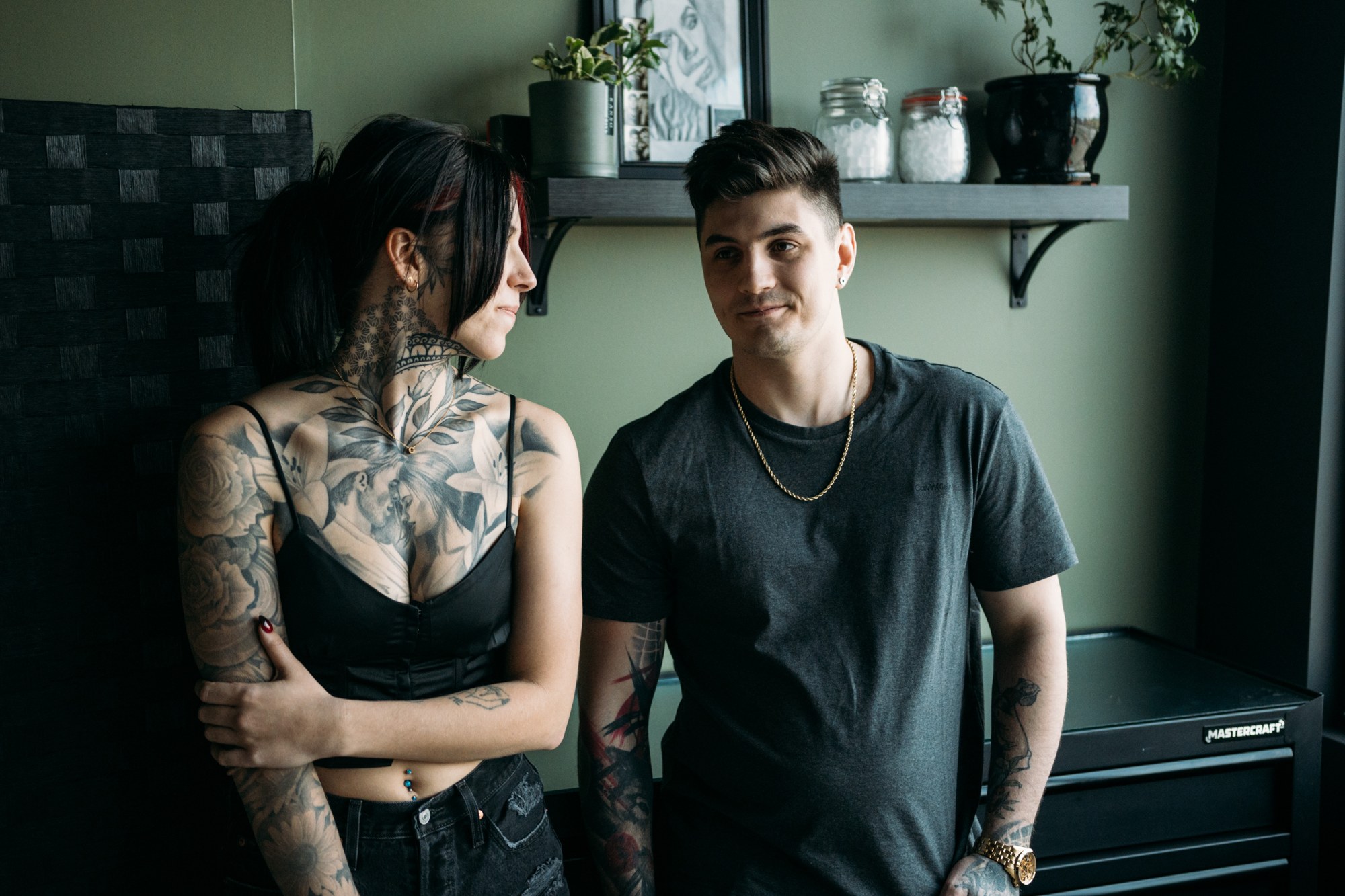 District Ink: An exchanged glance and gentle smile inside the studio.