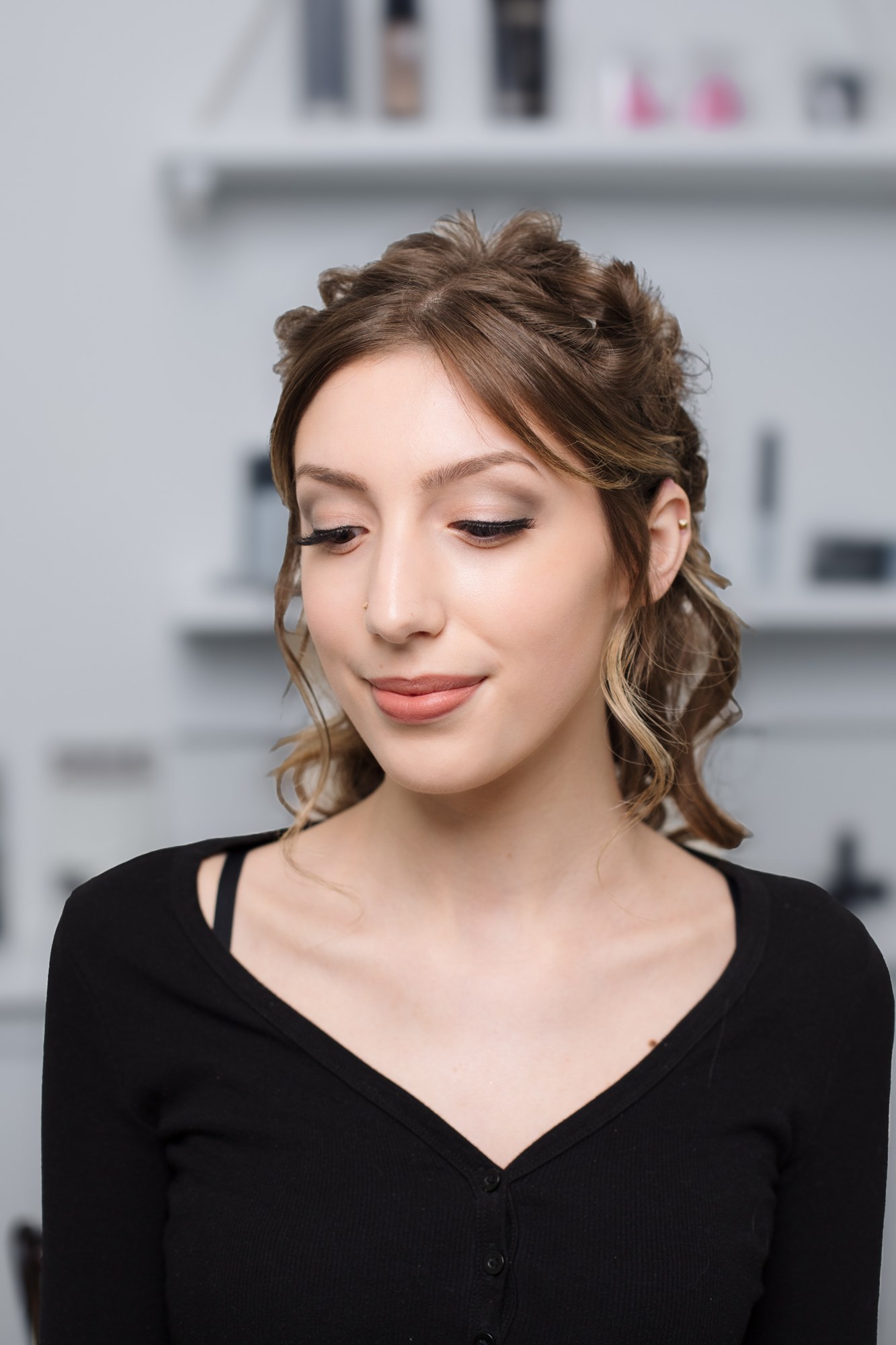 Bridal Beauty at Diva Den: Intentional eyes-down view of soft eye makeup.