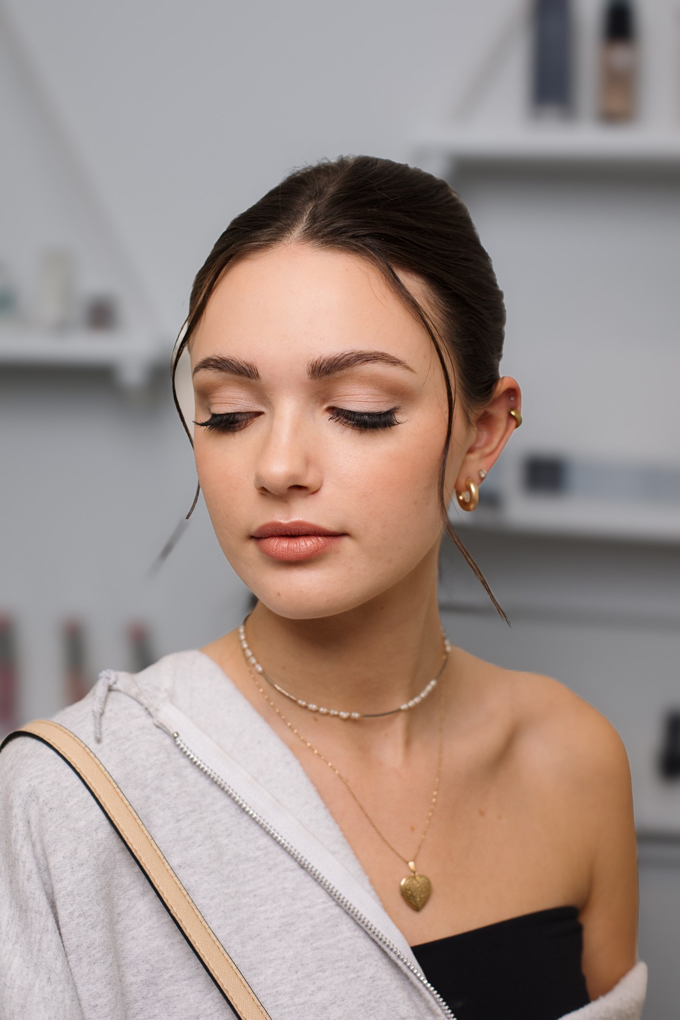 Bridal Beauty at Diva Den: Sky’s deliberately lowered gaze showing eye makeup.