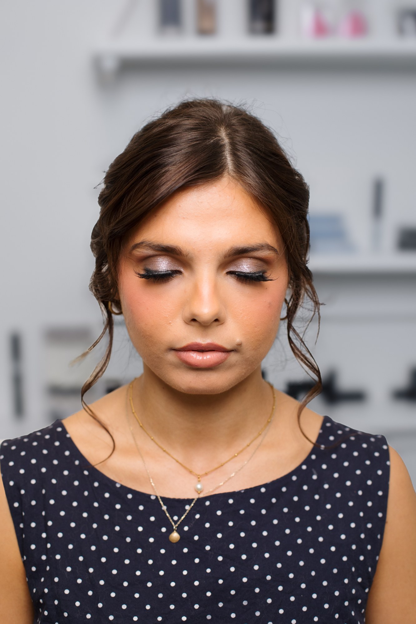 Bridal Beauty at Diva Den: Sunny’s deliberately lowered gaze showing eye makeup.