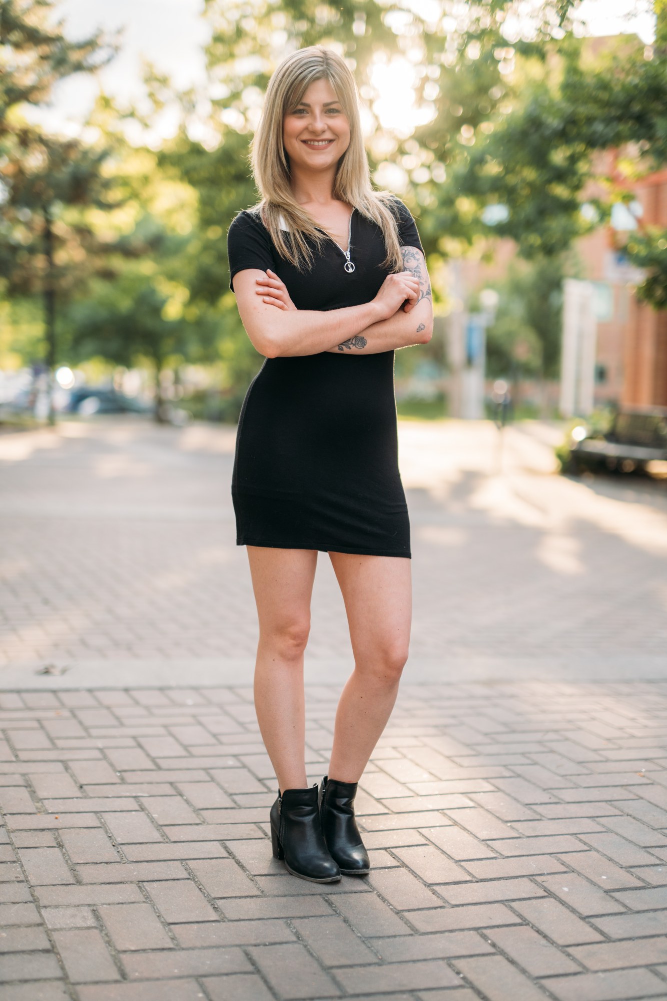 Diva Den Team Portraits: Full-length crossed-arm portrait of Sophia.
