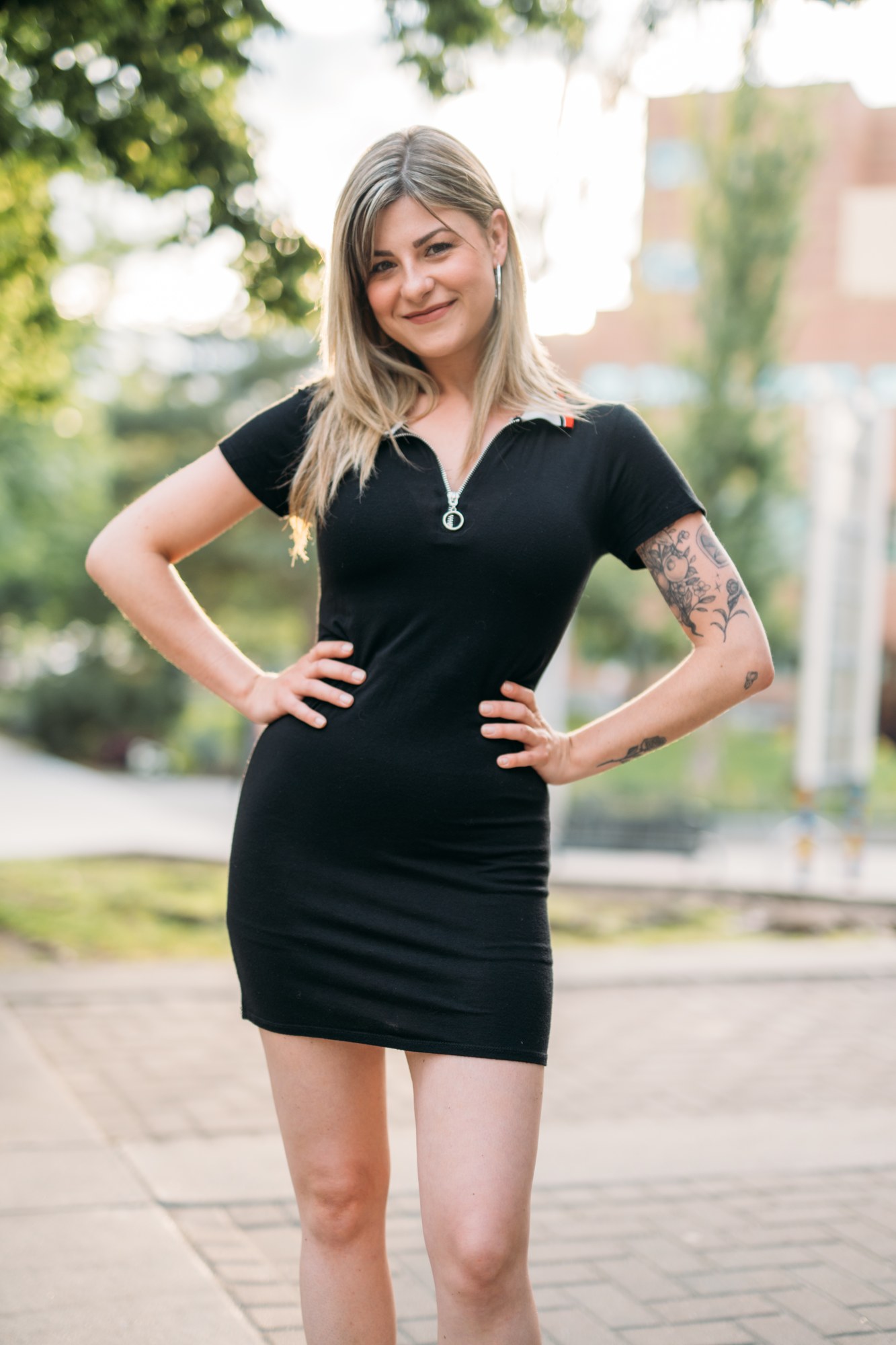 Diva Den Team Portraits: Hands-on-hips portrait of Sophia.