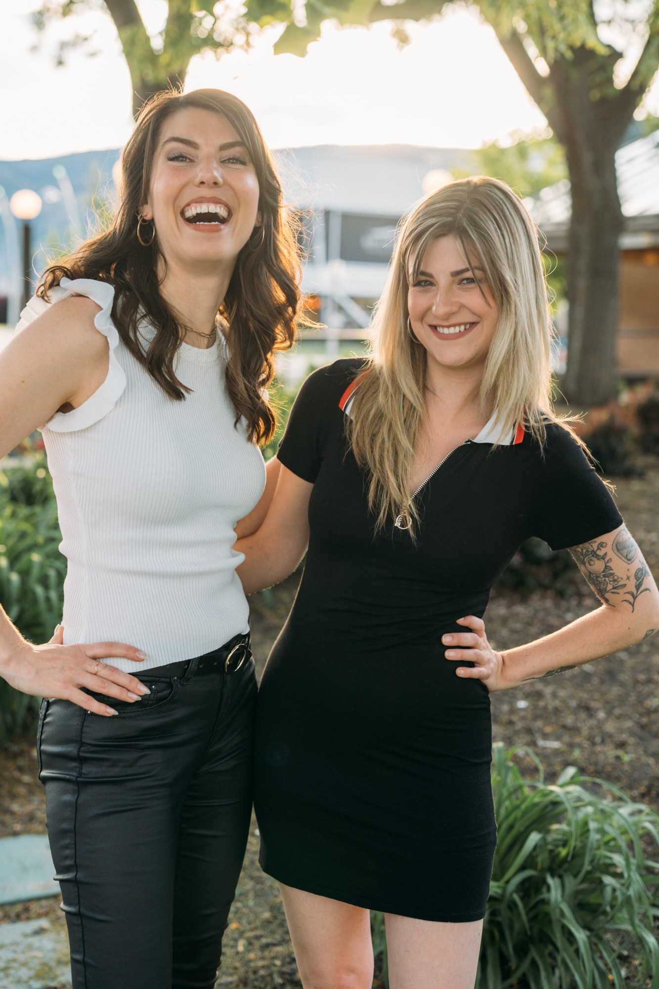 Diva Den Team Portraits: Lindsay laughing beside Sophia.