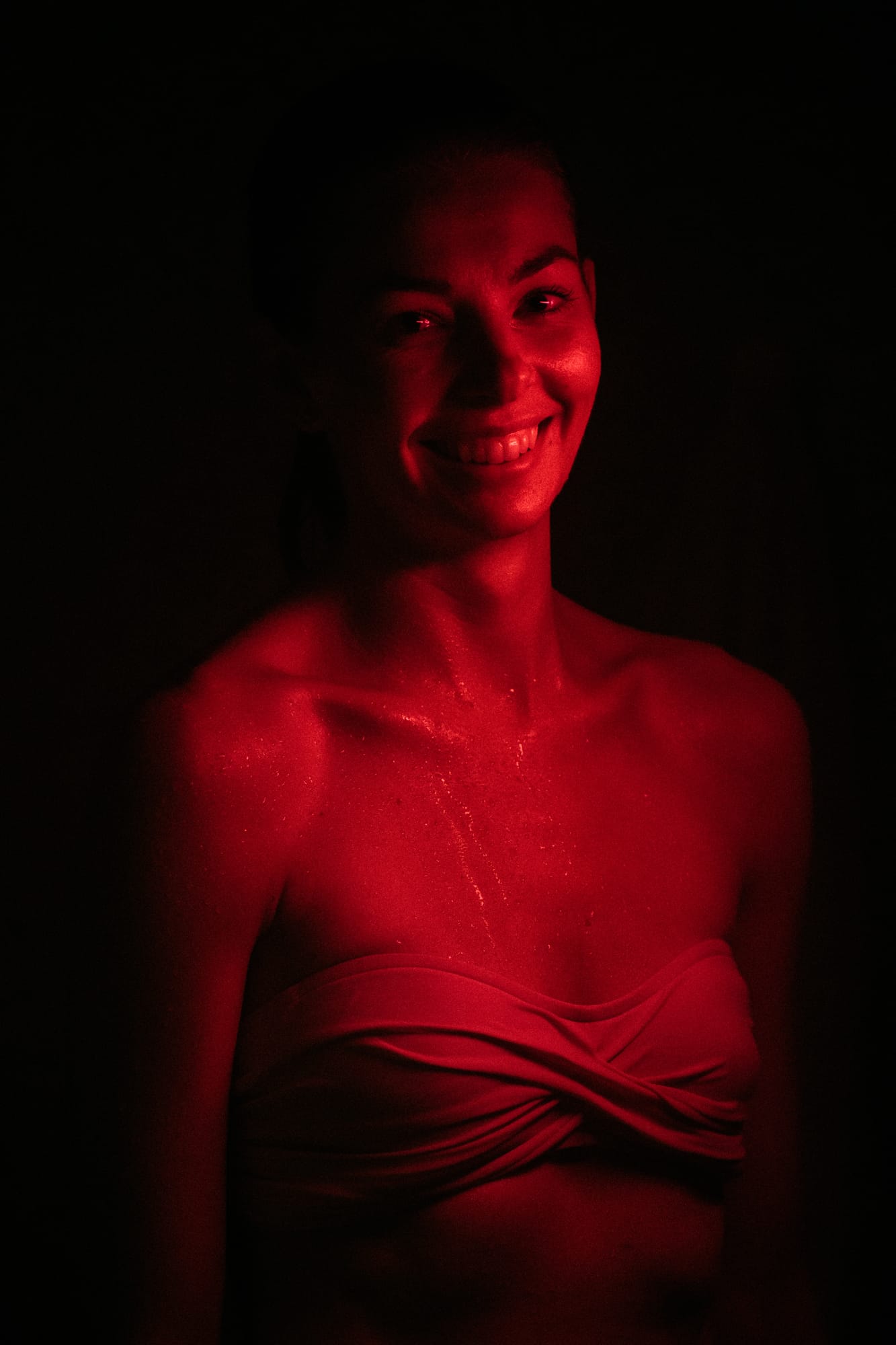 Float Space corporate story frame 21: A Float Space brand story with staff portraits, wellness atmosphere, red-light portrait texture and campaign-ready business imagery..
