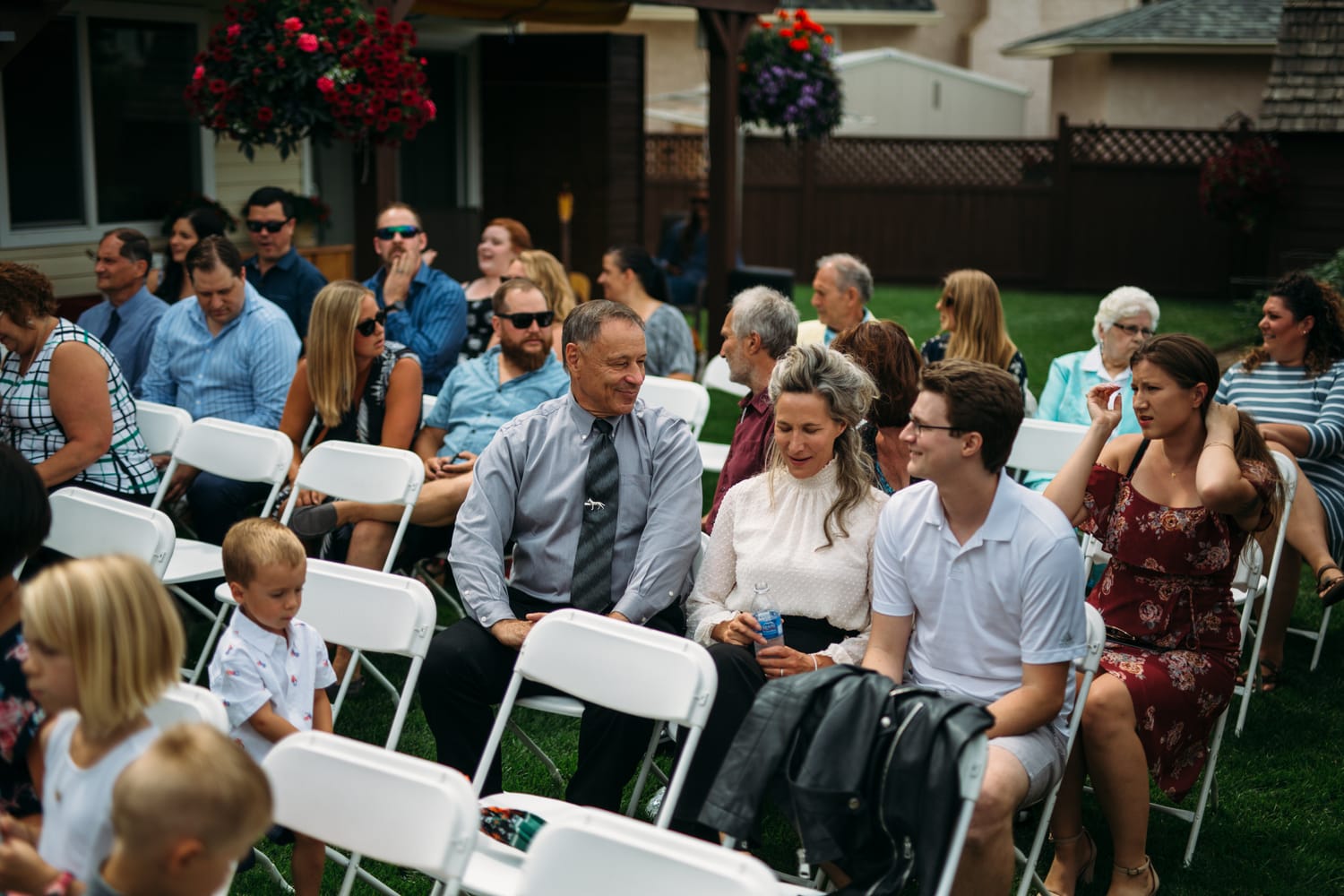 Hannah and Max weddings story frame 5: A sweet private backyard wedding in Kamloops, with family closeness, friend energy, weather and detail moments that make the archive feel alive..