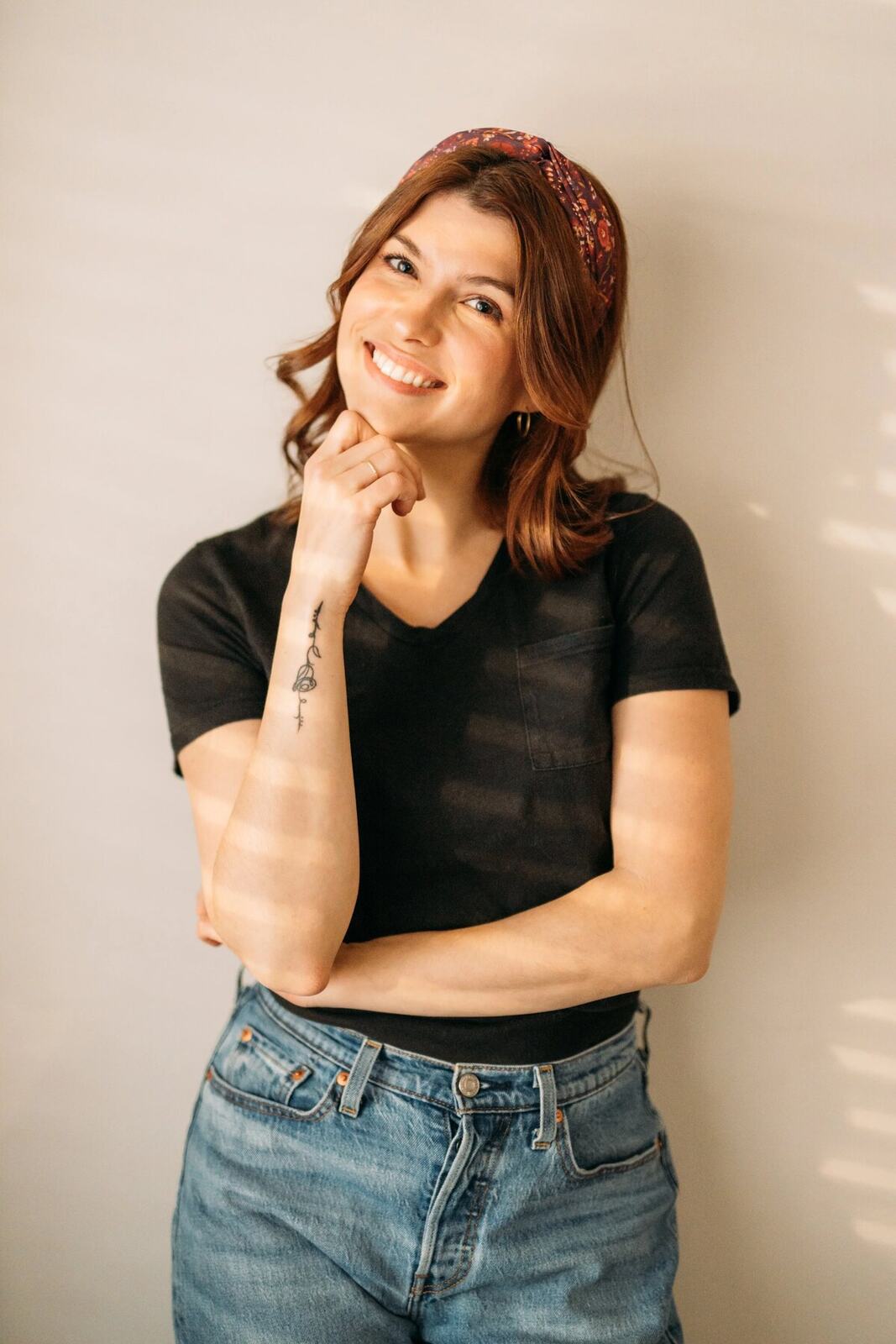 Warm professional portrait with relaxed body language