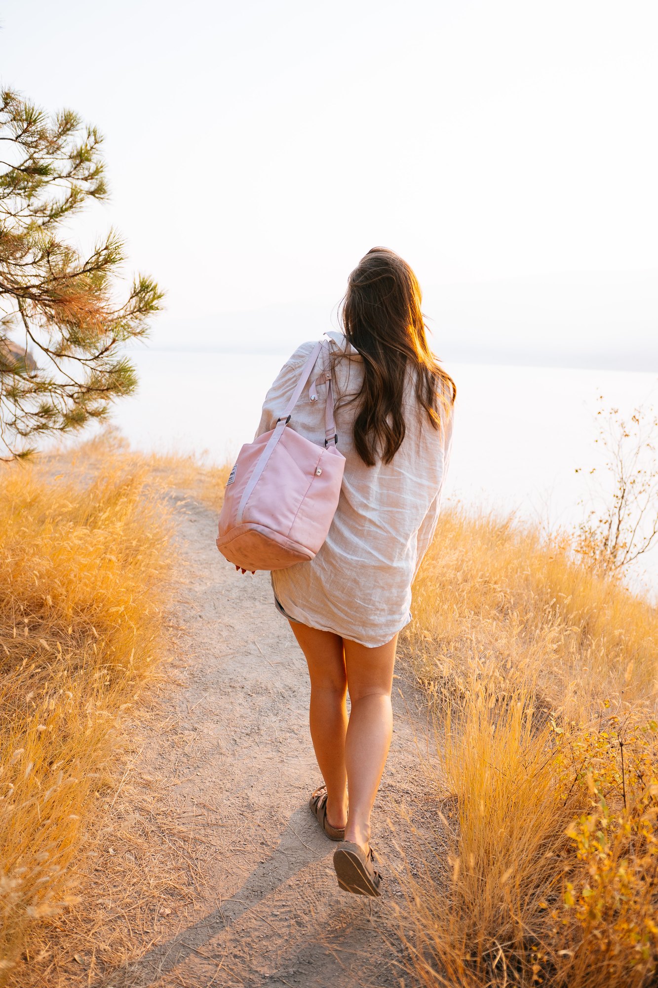 Holly — walking down the trail towards the lake