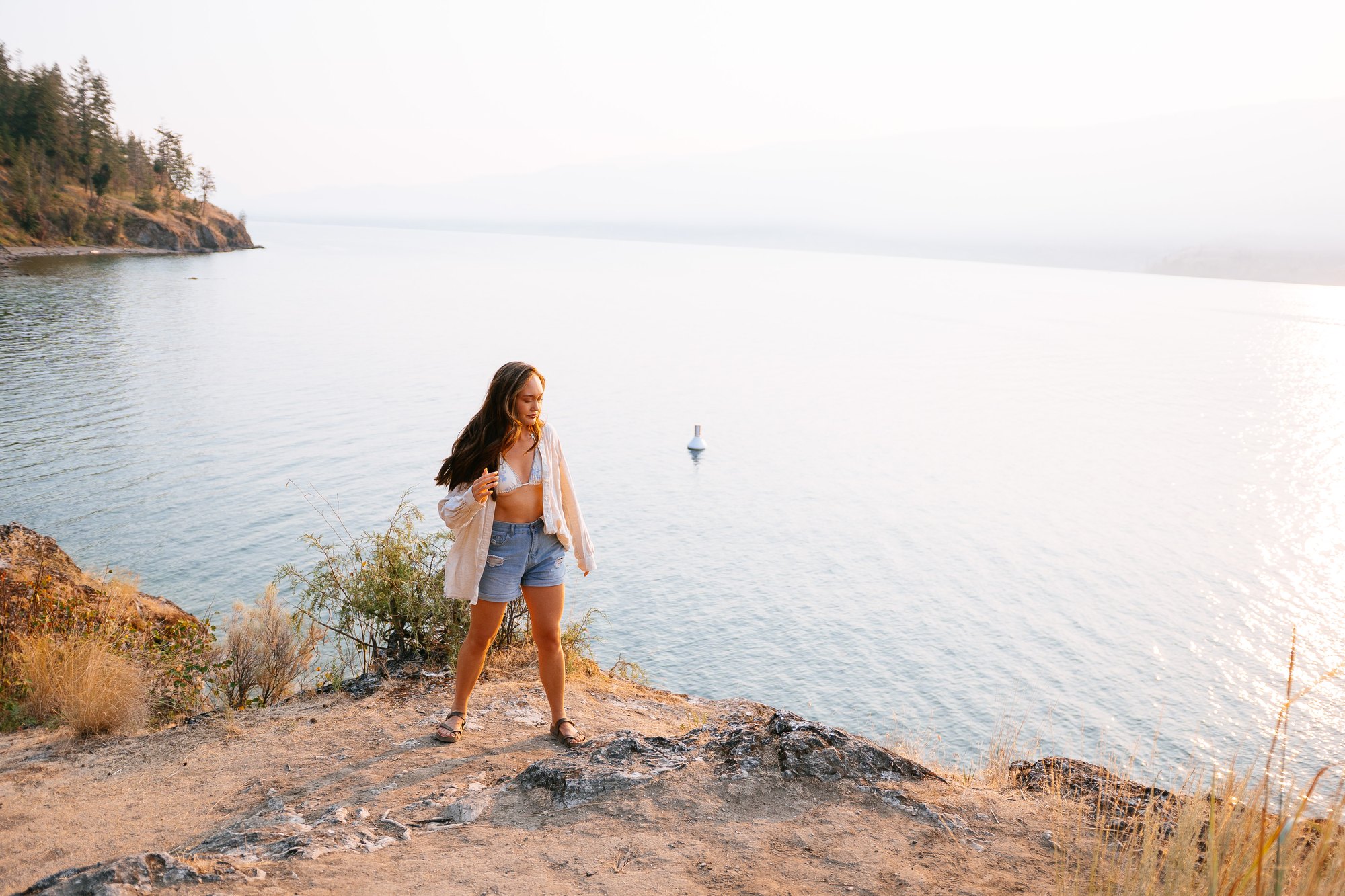 Holly — a wide portrait above the shoreline
