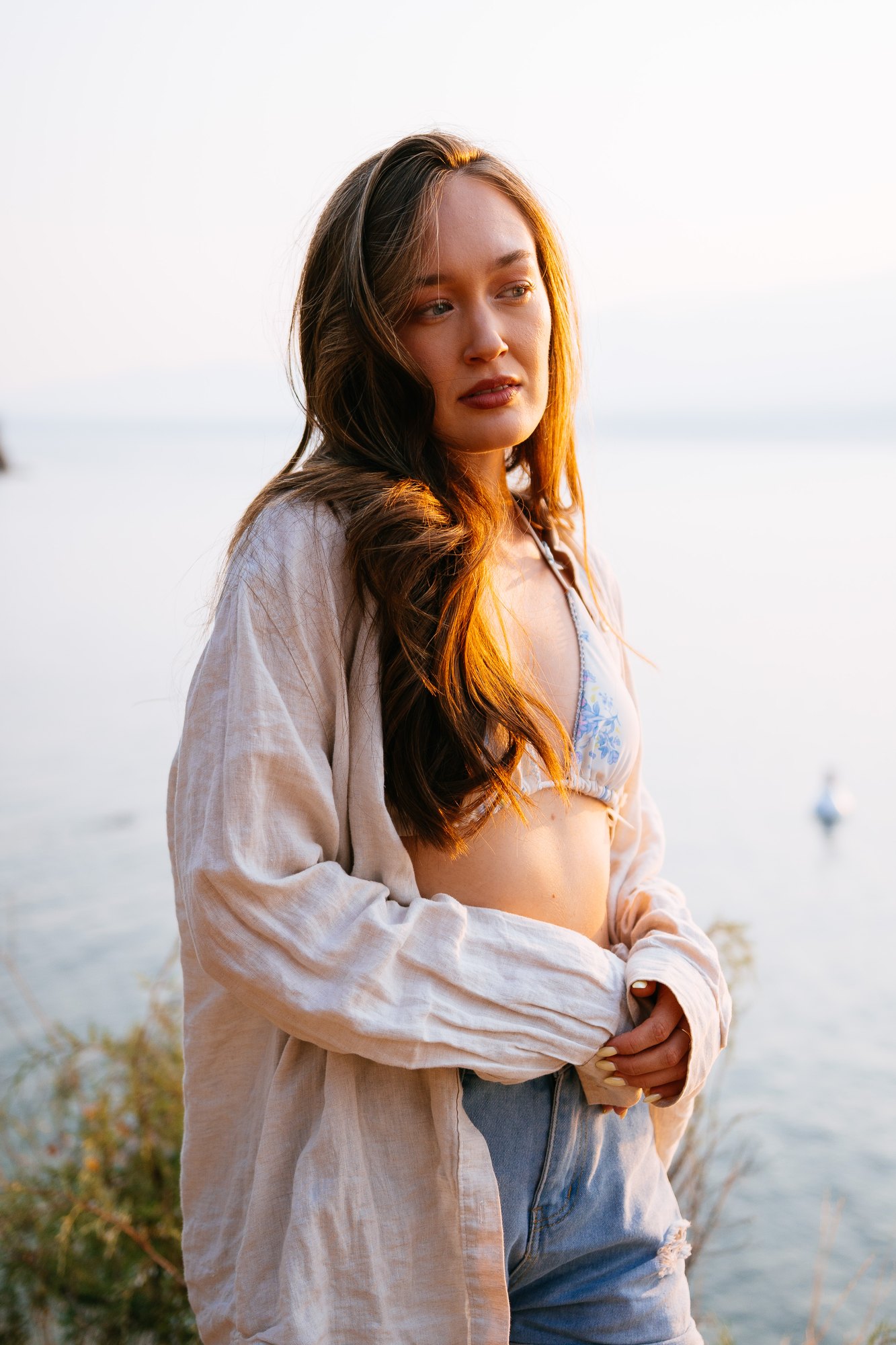 Holly — white linen shirt and denim beside the overlook