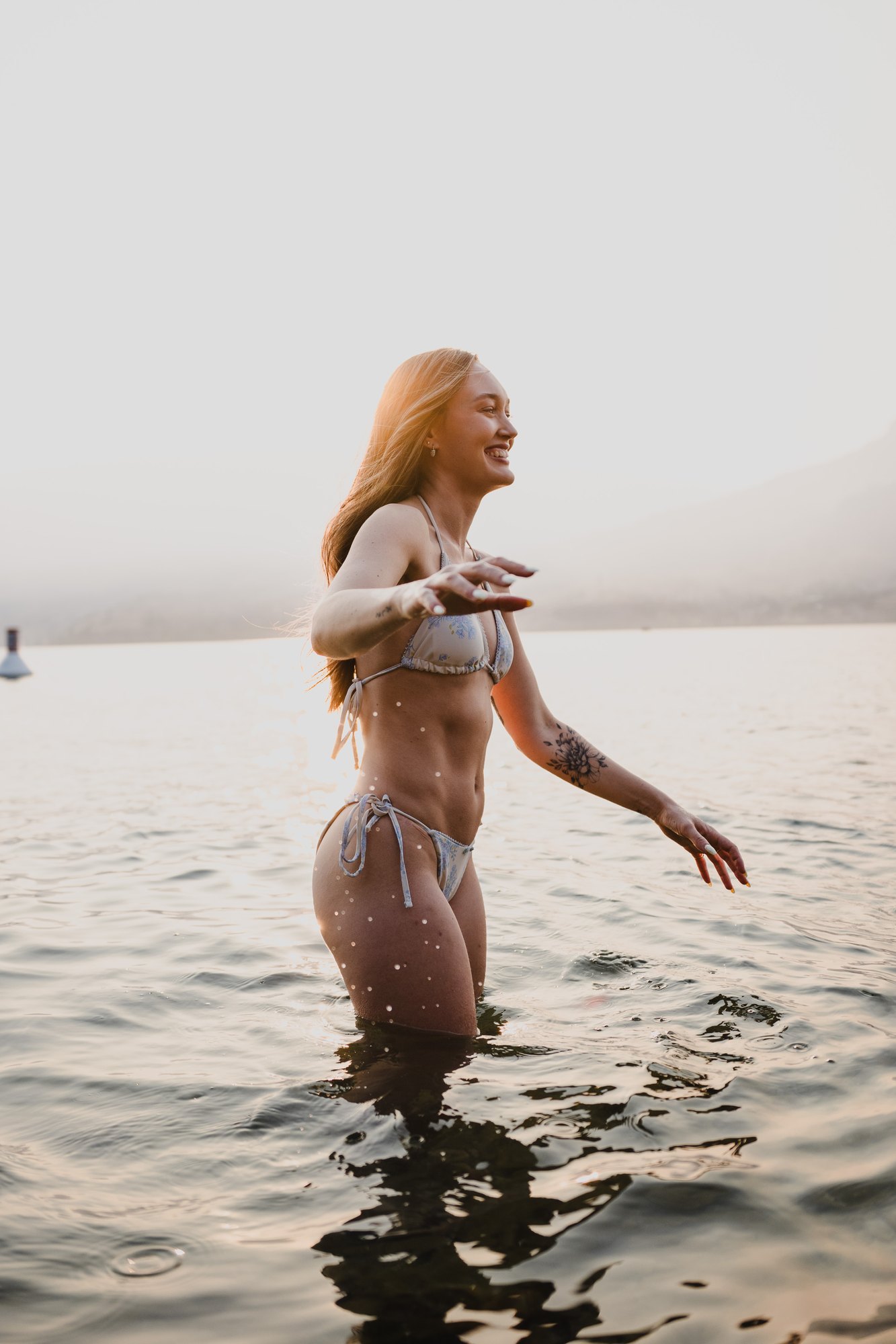 Holly — turning through the water with a loose gesture