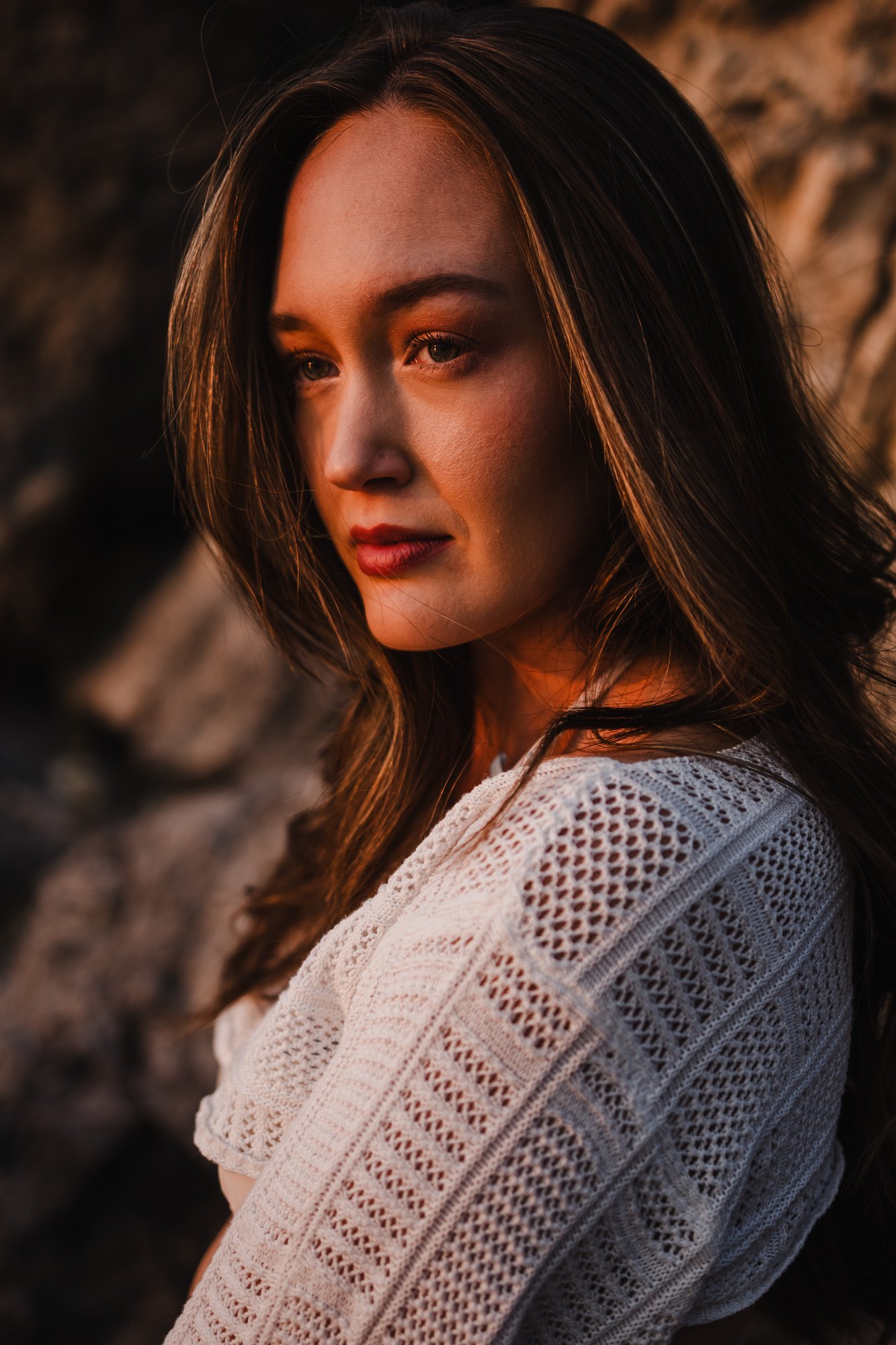 Holly — close portrait in a white crochet top
