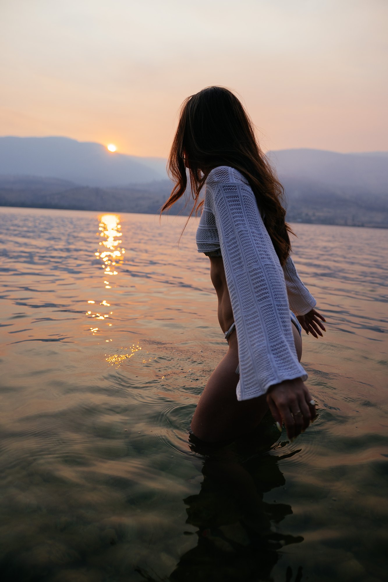 Holly — walking quietly through the sunset water