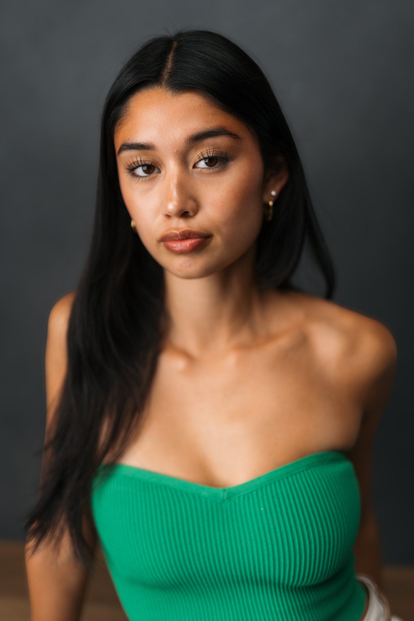 Julia Crofoot — close portrait beside the table