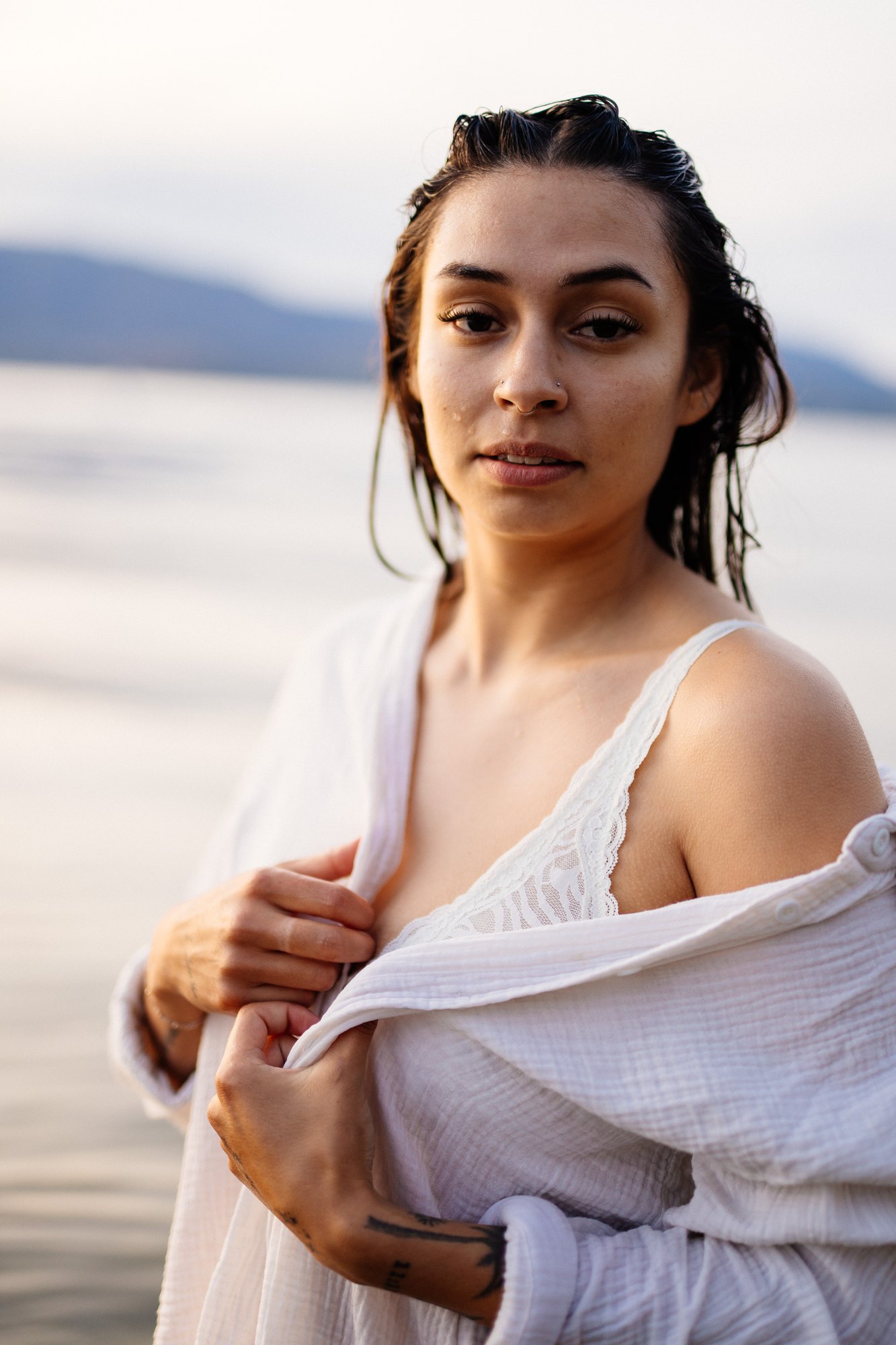 Karly — wet-haired portrait with a white shirt over her shoulder