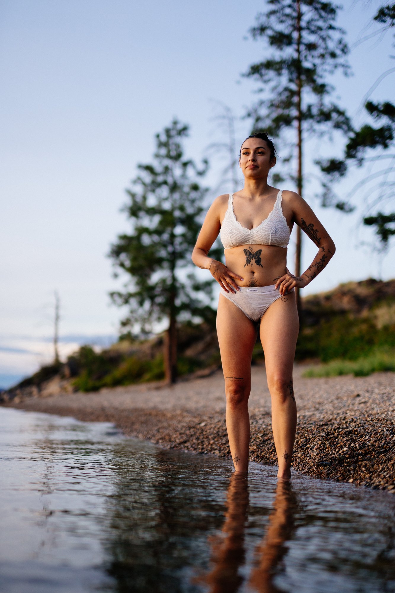 Karly — full-length portrait in a white two-piece outfit