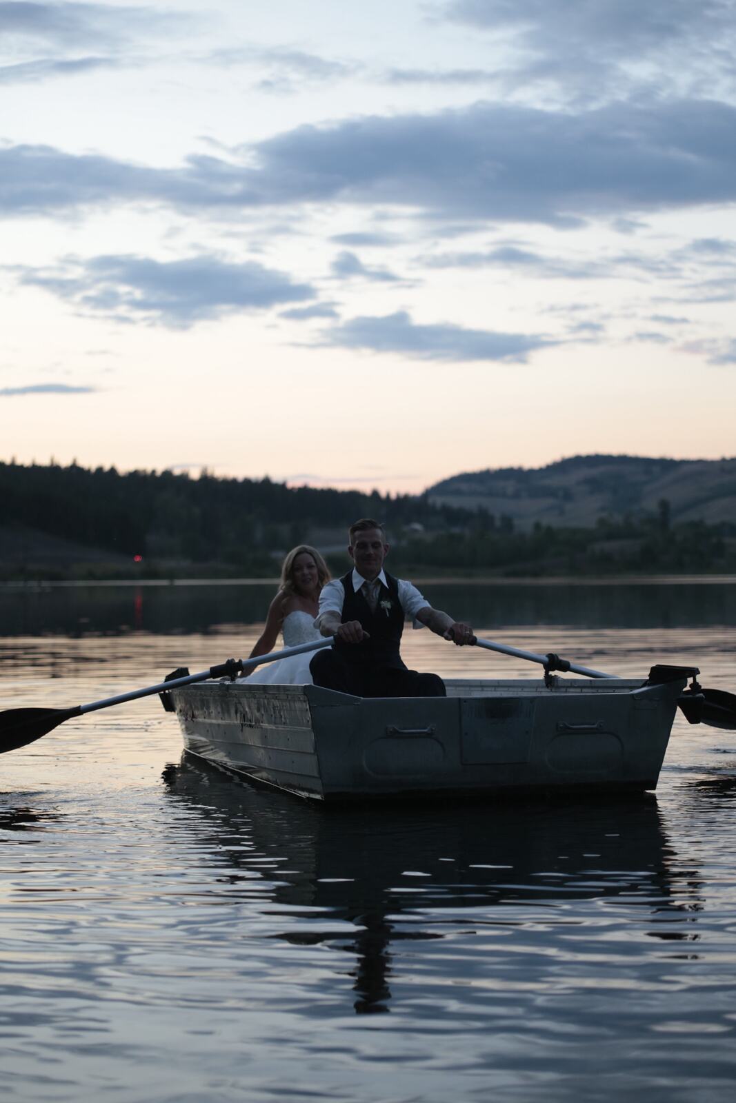 Kendra and Mike story frame 5: An older wedding story with lake dusk, warm room light, speeches, dancing and a full-day feeling.