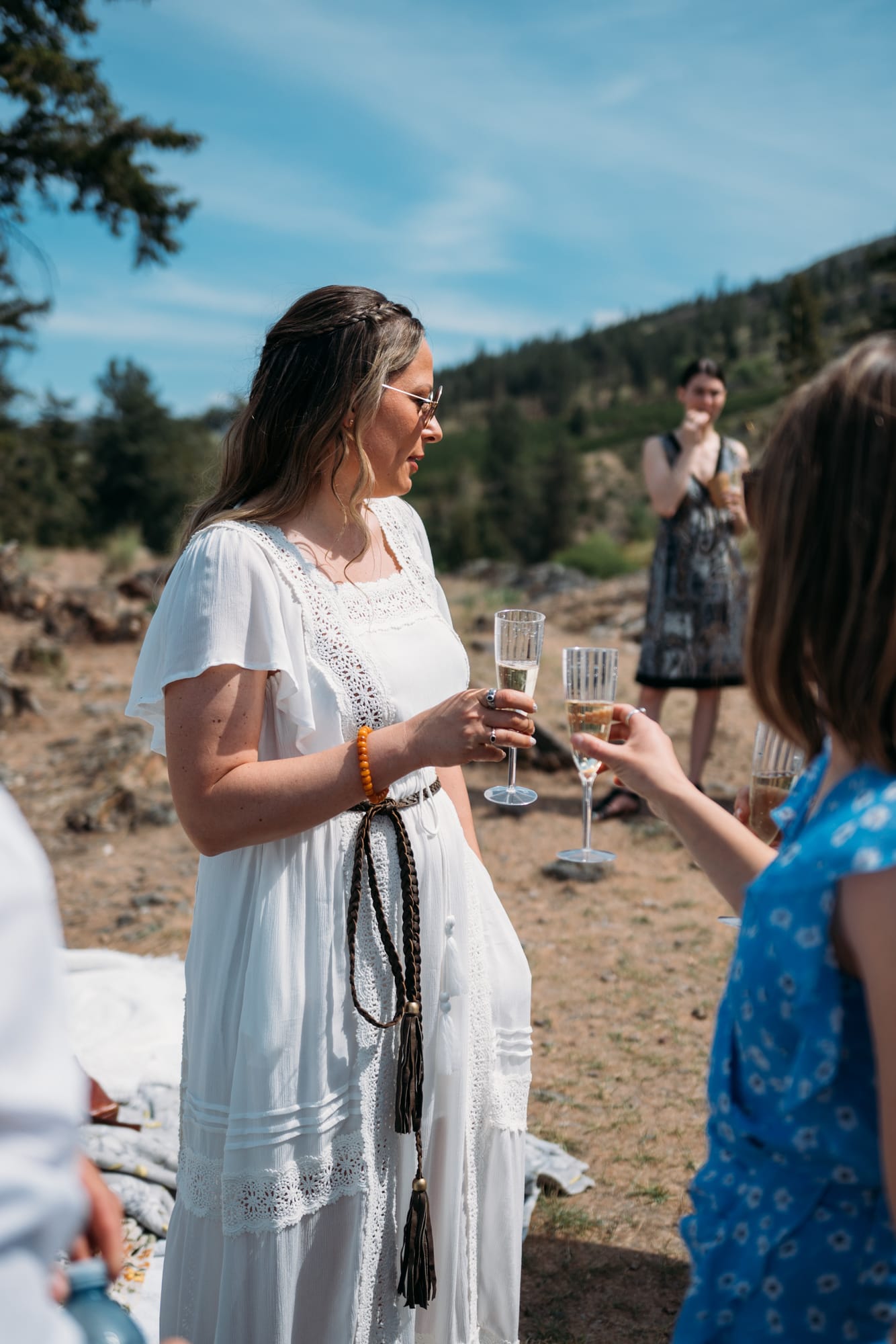 Kristina and Mark weddings story frame 16: A Bertram Creek wedding in South Kelowna with Okanagan Lake light, film-friend history, family texture and Lithuanian food and planning details..
