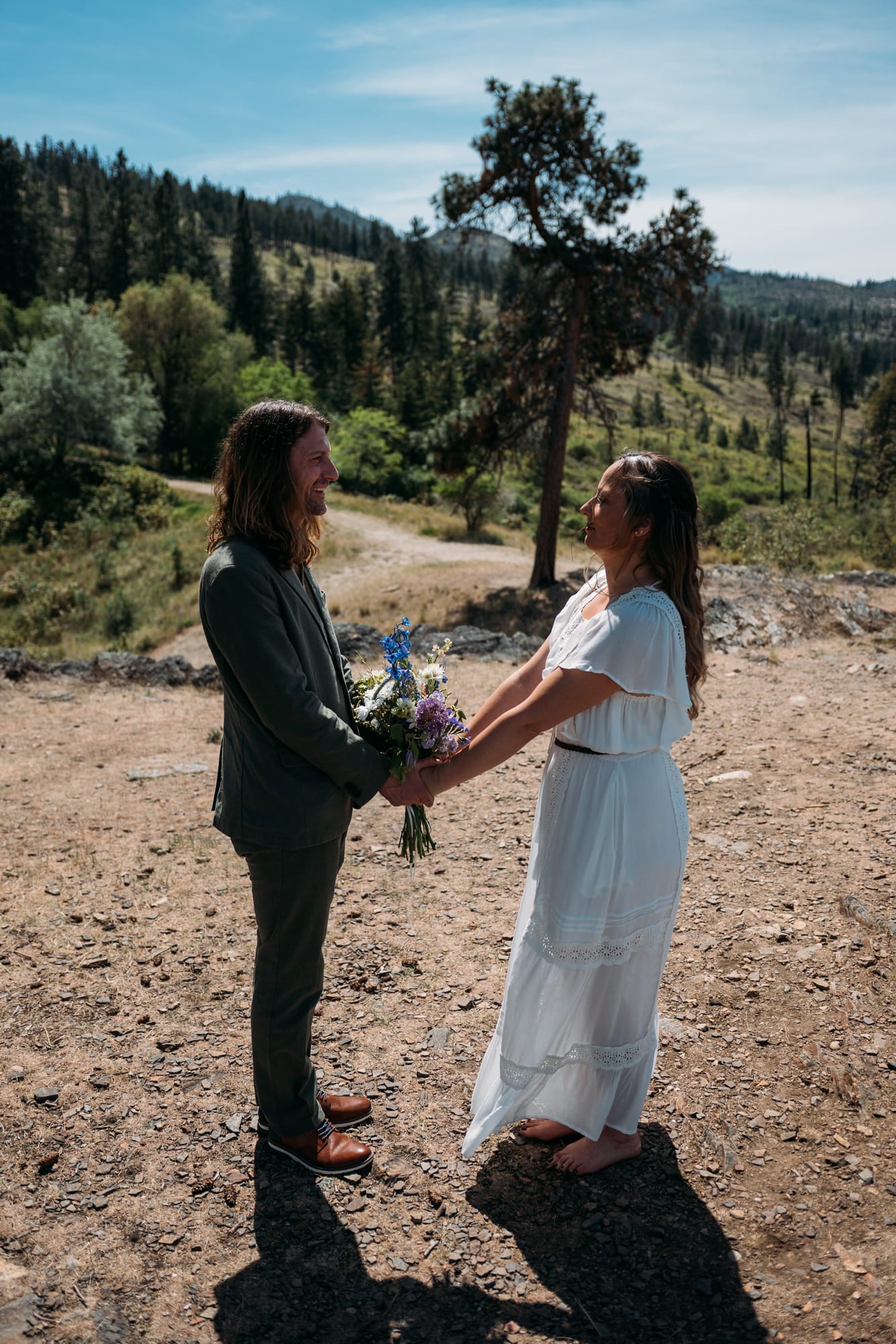 Kristina and Mark weddings story frame 19: A Bertram Creek wedding in South Kelowna with Okanagan Lake light, film-friend history, family texture and Lithuanian food and planning details..