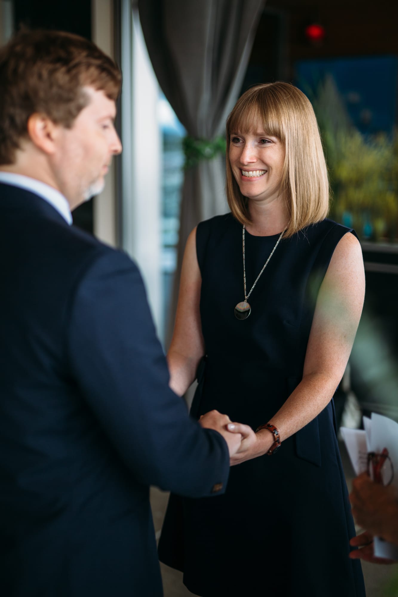 Kristine and Mike weddings story frame 15: A small downtown Kelowna wedding at the Kelowna Yacht Club, with sweet family, detail frames, flattering angles and quiet waterfront polish..