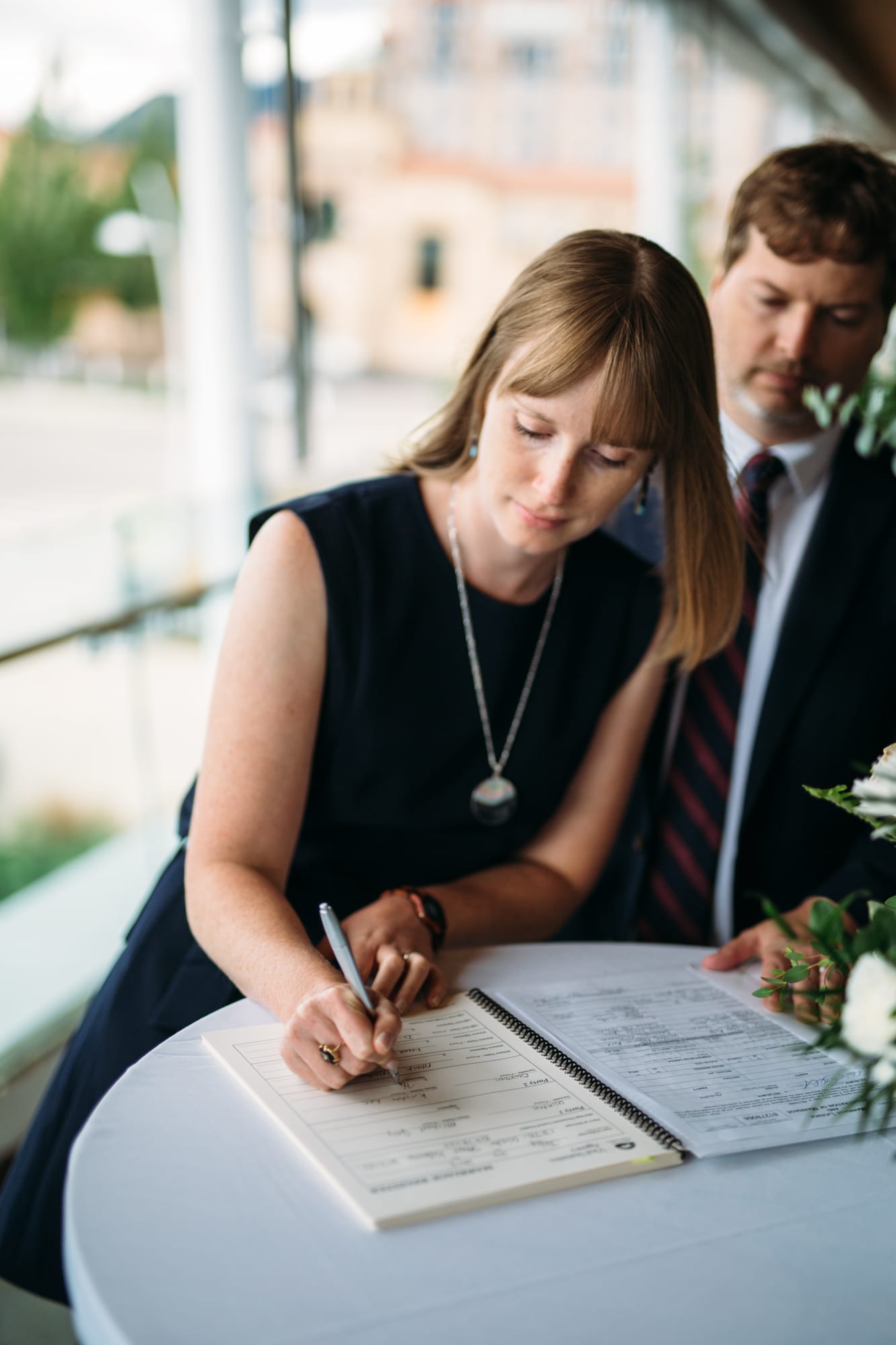 Kristine and Mike weddings story frame 17: A small downtown Kelowna wedding at the Kelowna Yacht Club, with sweet family, detail frames, flattering angles and quiet waterfront polish..