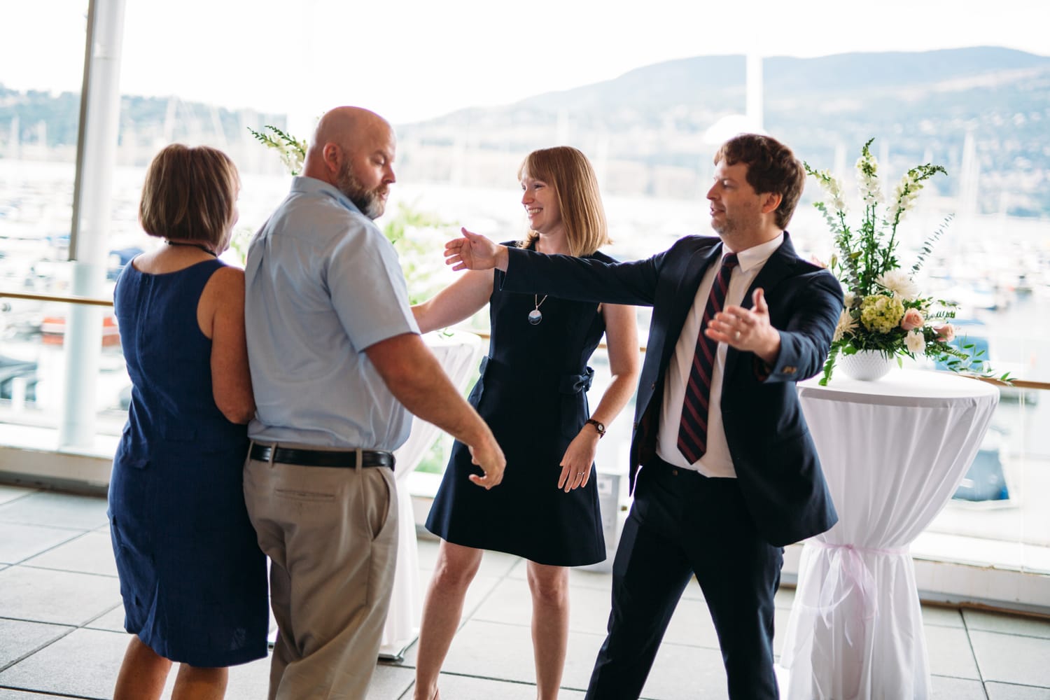 Kristine and Mike weddings story frame 21: A small downtown Kelowna wedding at the Kelowna Yacht Club, with sweet family, detail frames, flattering angles and quiet waterfront polish..