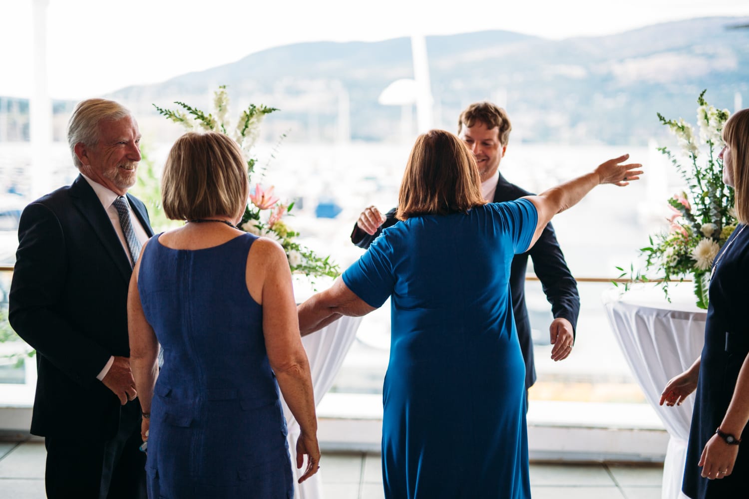 Kristine and Mike weddings story frame 22: A small downtown Kelowna wedding at the Kelowna Yacht Club, with sweet family, detail frames, flattering angles and quiet waterfront polish..