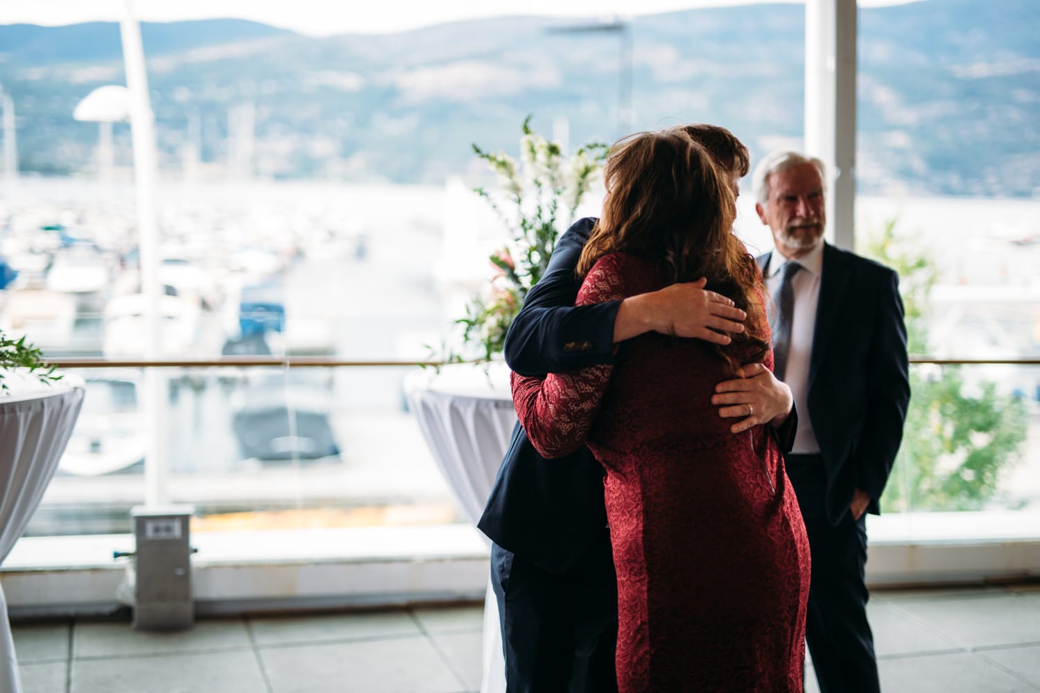Kristine and Mike weddings story frame 23: A small downtown Kelowna wedding at the Kelowna Yacht Club, with sweet family, detail frames, flattering angles and quiet waterfront polish..