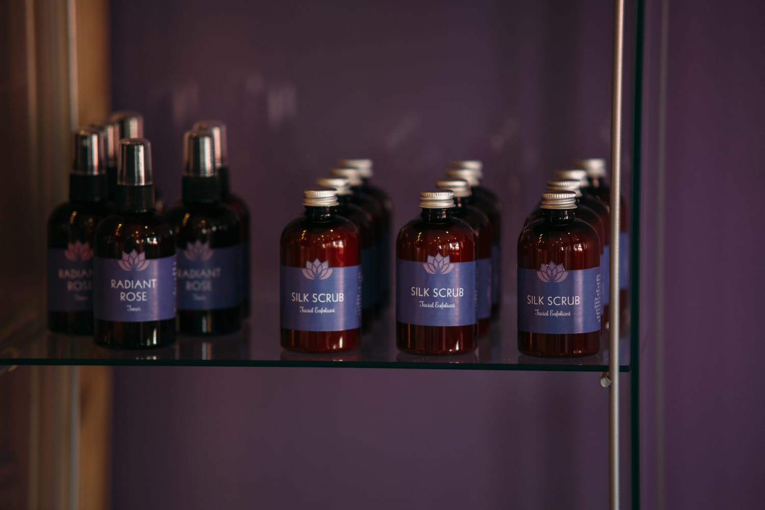 Lavender Lotus corporate story frame 16: Wellness brand photography for Lavender Lotus in the Okanagan, with interiors, product details, owner portraits, staff portraits and treatment-room atmosphere for a local wellness business..