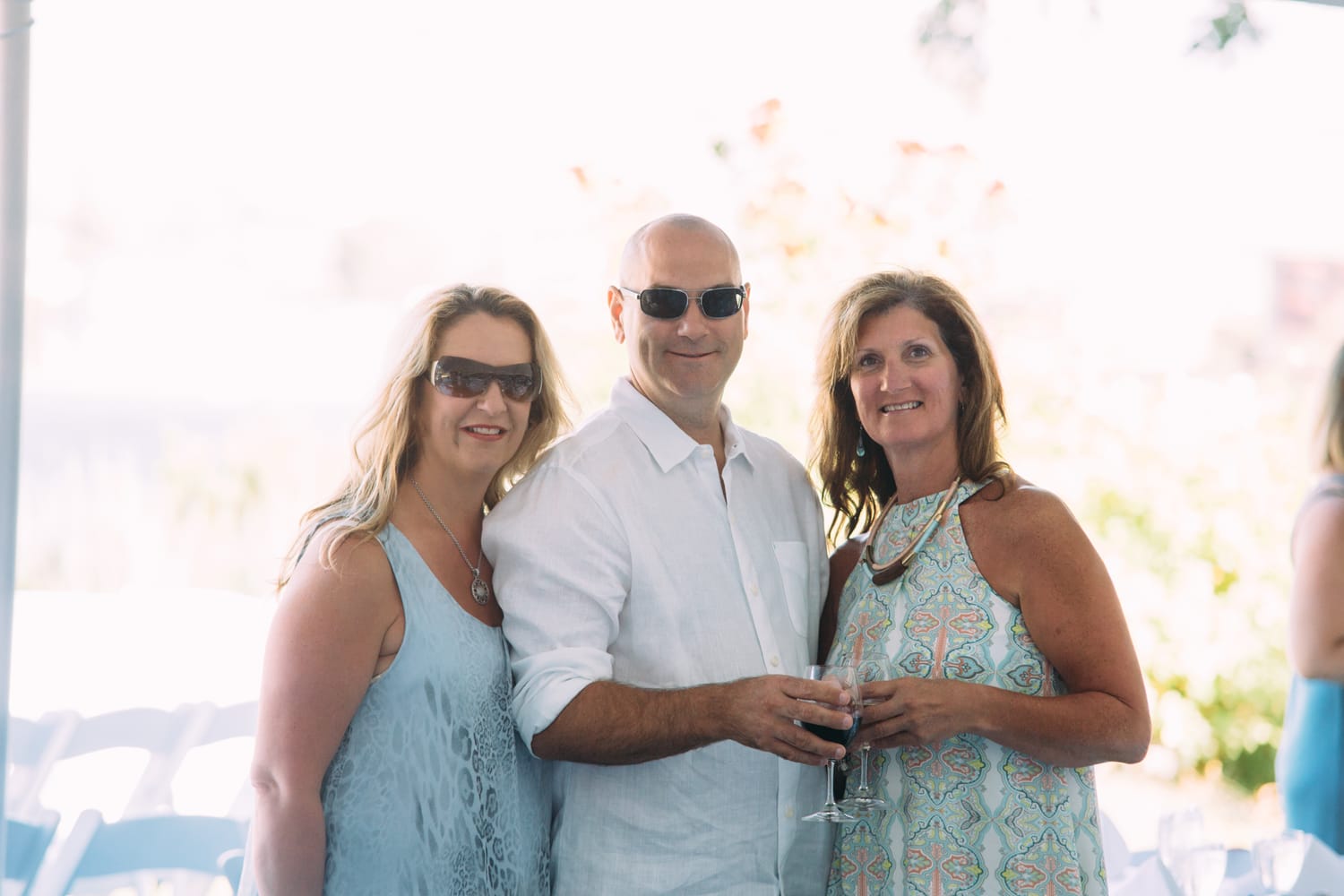 Leeanne and Kelly weddings story frame 14: A Watermark Beach Resort wedding in Osoyoos, built around lakefront context, grown-family connection and careful, big-hearted coverage..