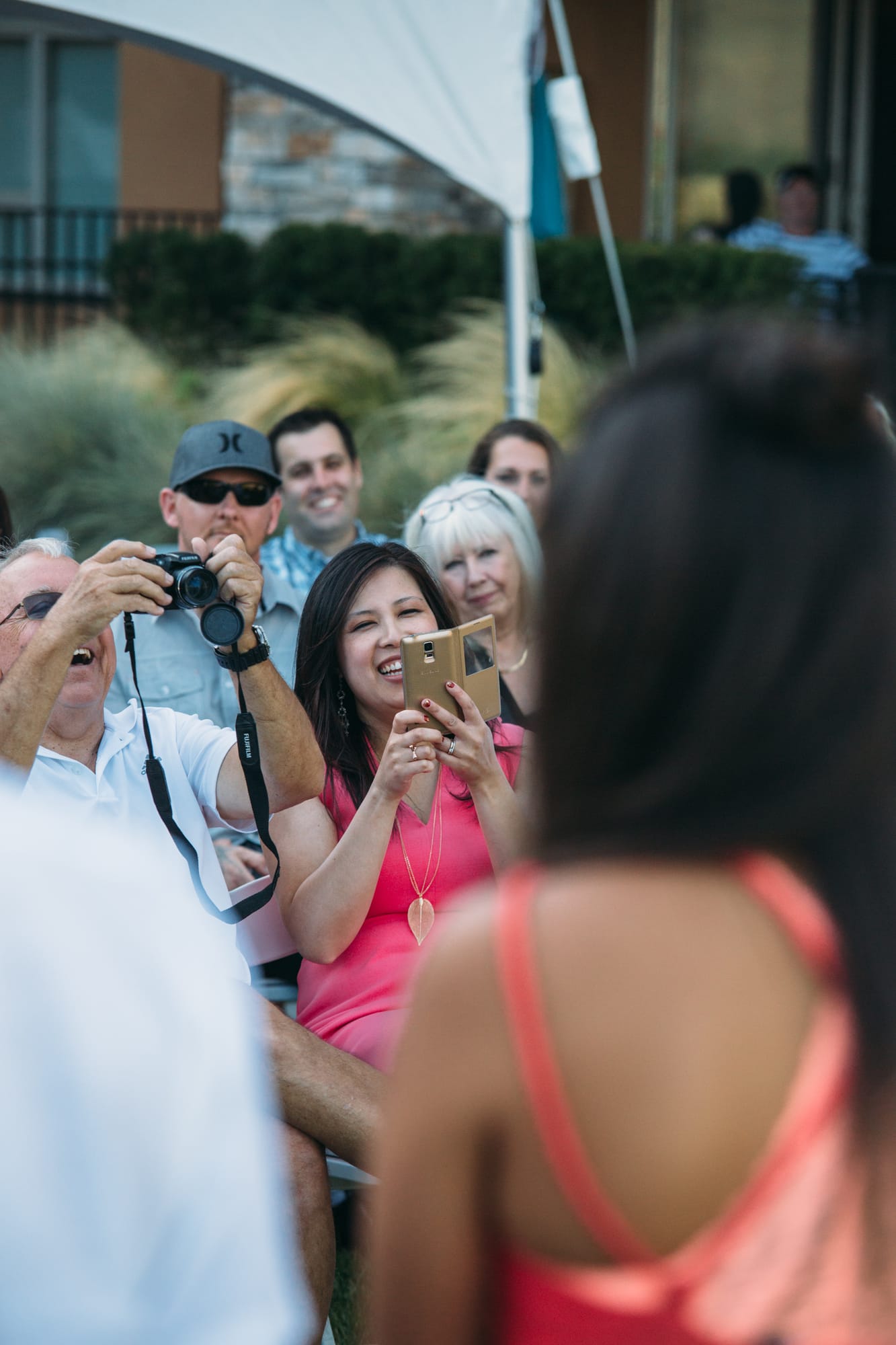 Leeanne and Kelly weddings story frame 19: A Watermark Beach Resort wedding in Osoyoos, built around lakefront context, grown-family connection and careful, big-hearted coverage..