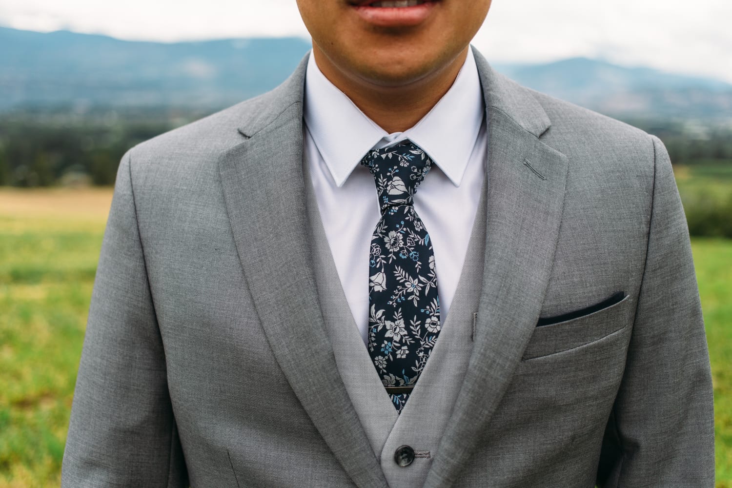 Leslie and Gerome weddings story frame 1: A Brook & Barn - Casorso Heritage Farm wedding in Kelowna, with orchard details, outbuildings, lawn games and a familiar friend-party feeling..