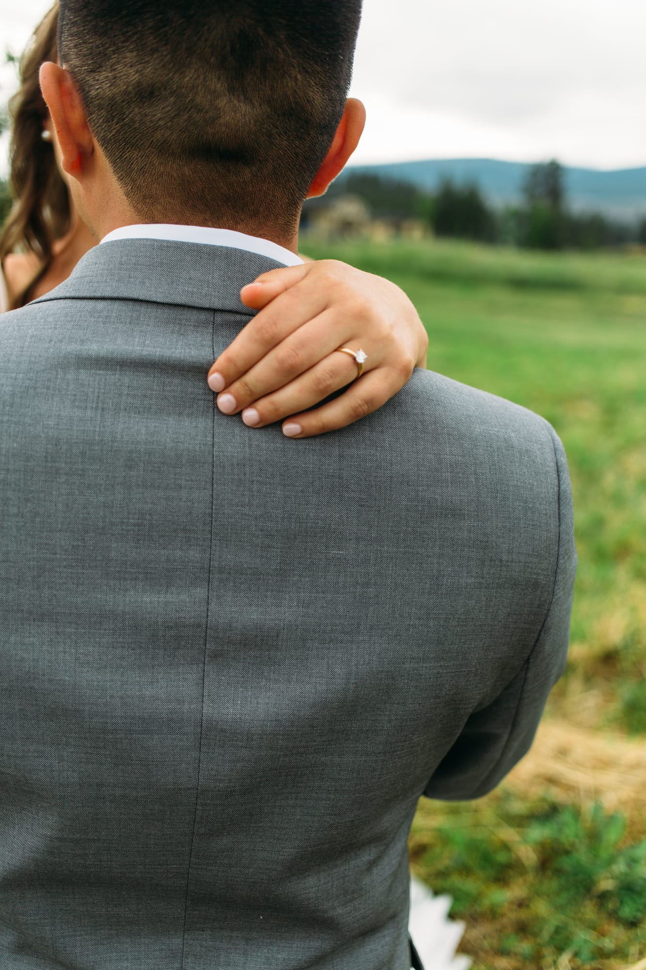 Leslie and Gerome weddings story frame 3: A Brook & Barn - Casorso Heritage Farm wedding in Kelowna, with orchard details, outbuildings, lawn games and a familiar friend-party feeling..