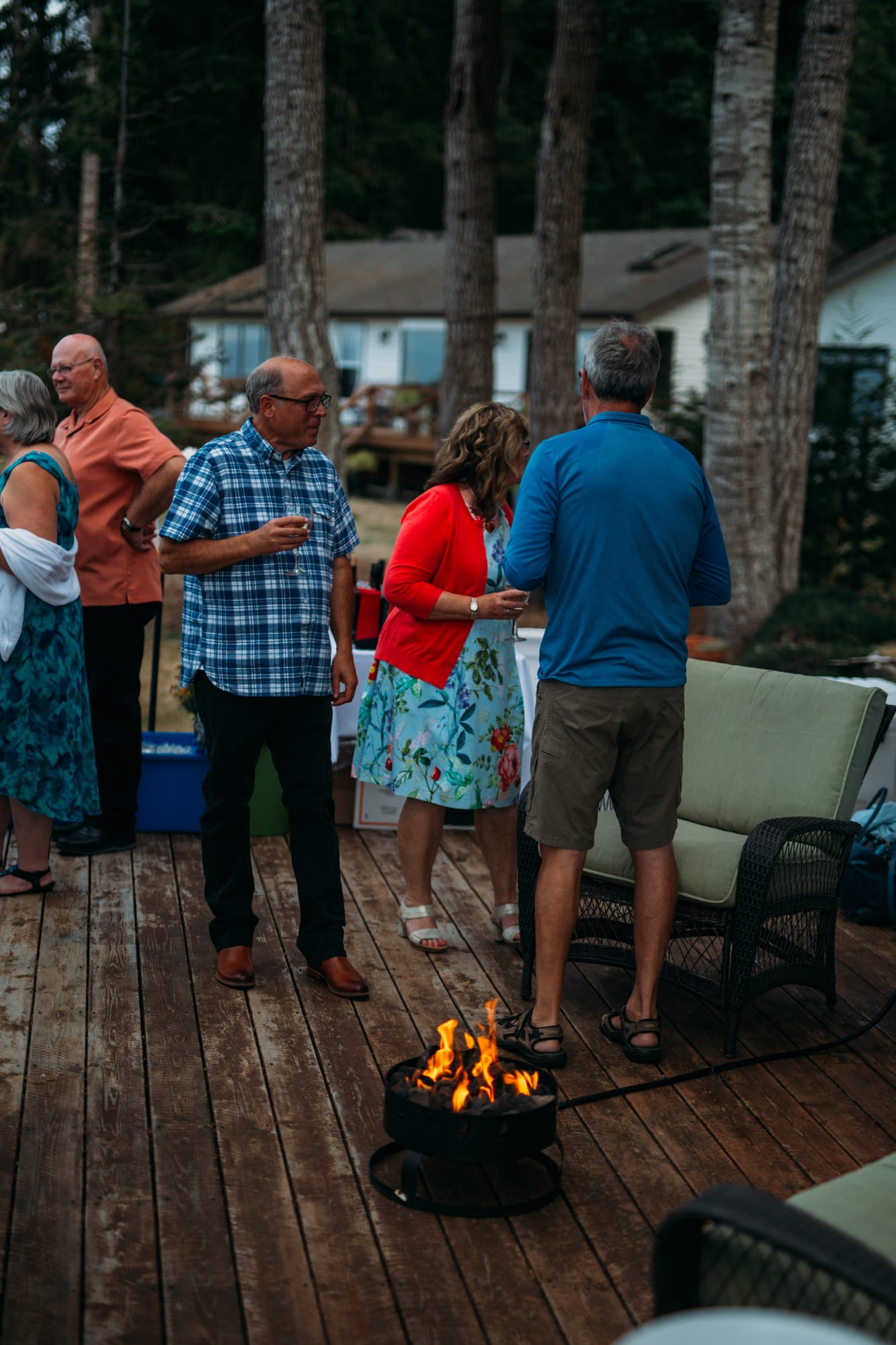 Mara and Casey weddings story frame 2: A Vancouver Island private-home wedding near Qualicum Beach, with Bowser prep, Friday gathering energy, custom vendors, kids, friends and cool Island air..