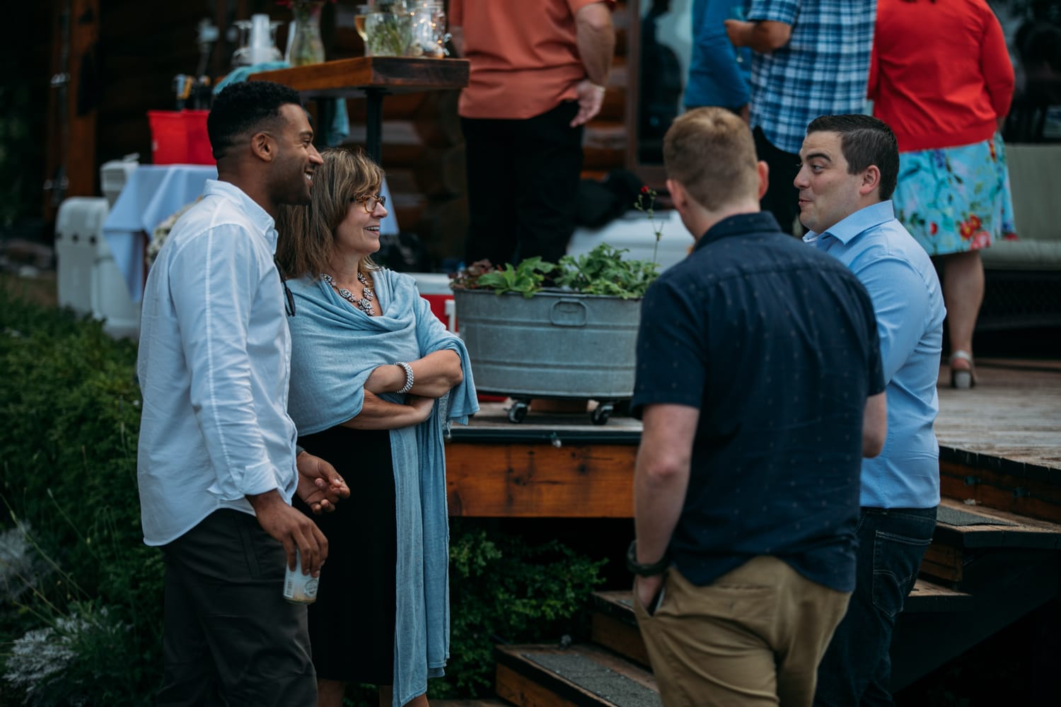 Mara and Casey weddings story frame 3: A Vancouver Island private-home wedding near Qualicum Beach, with Bowser prep, Friday gathering energy, custom vendors, kids, friends and cool Island air..