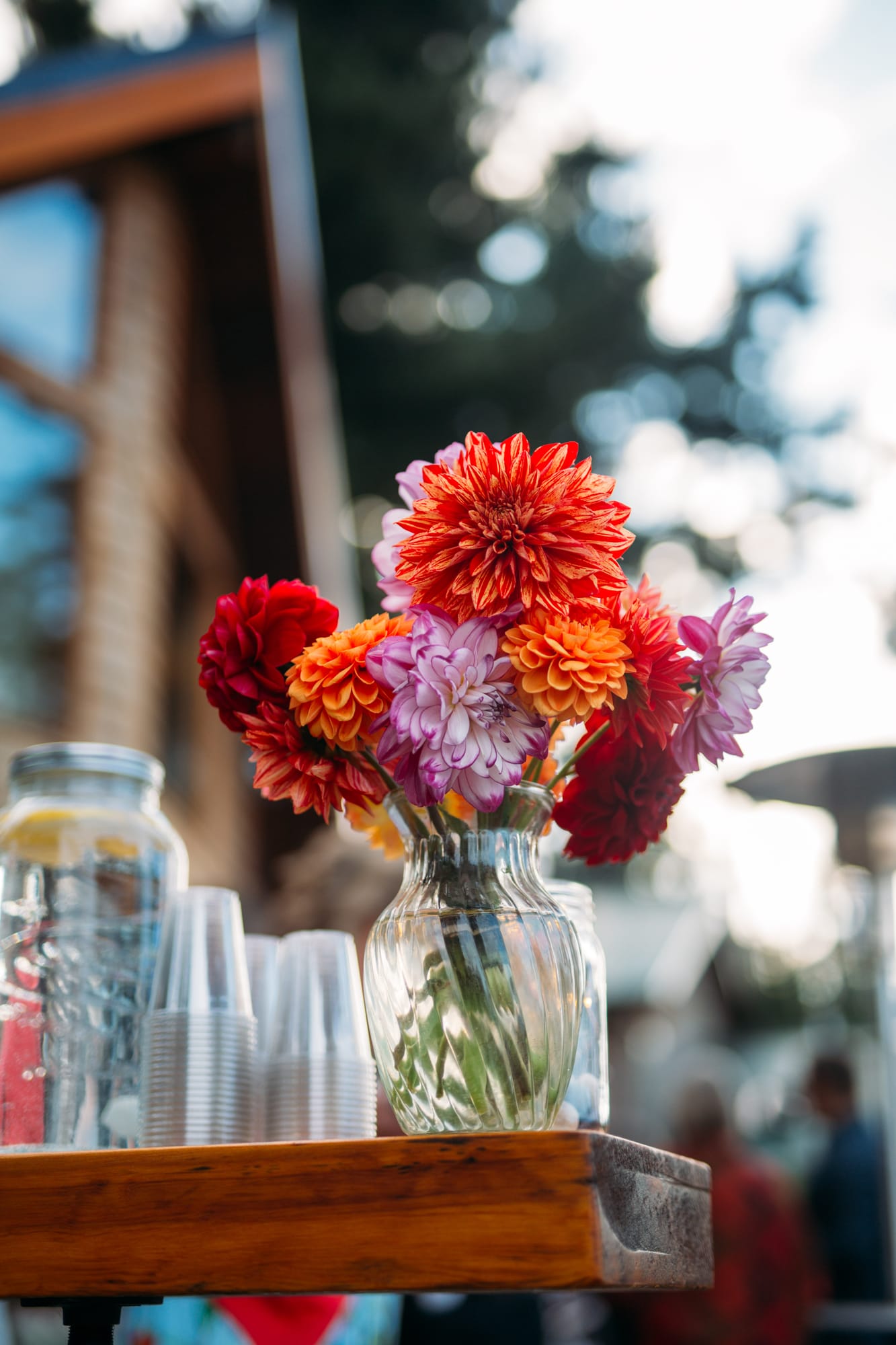 Mara and Casey weddings story frame 6: A Vancouver Island private-home wedding near Qualicum Beach, with Bowser prep, Friday gathering energy, custom vendors, kids, friends and cool Island air..